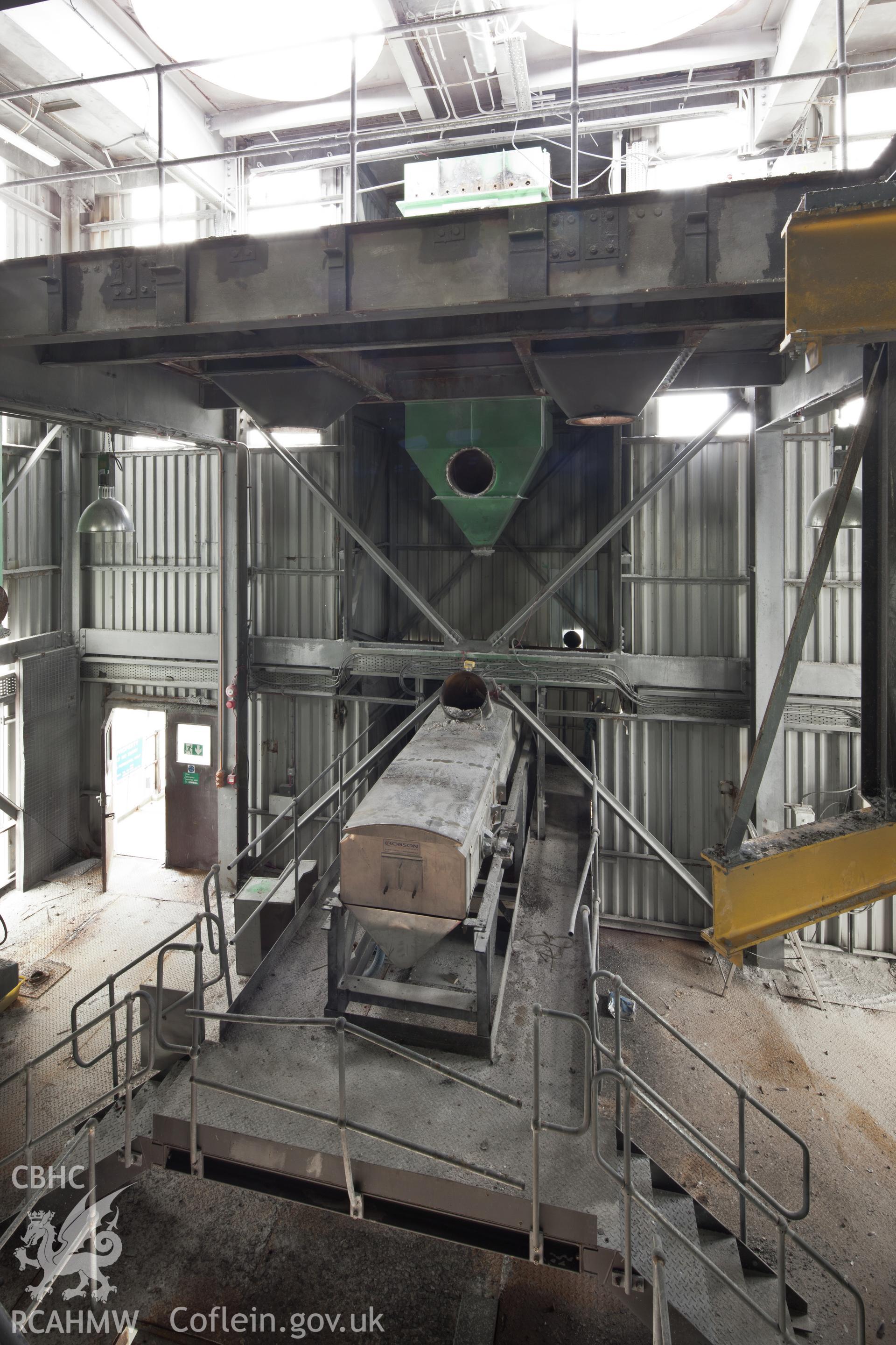 Conveyor belt with storage hopper above within the northern travelling unloader situated at the end of Salt Island Jetty. Taken by Iain Wright, 5/10/11.