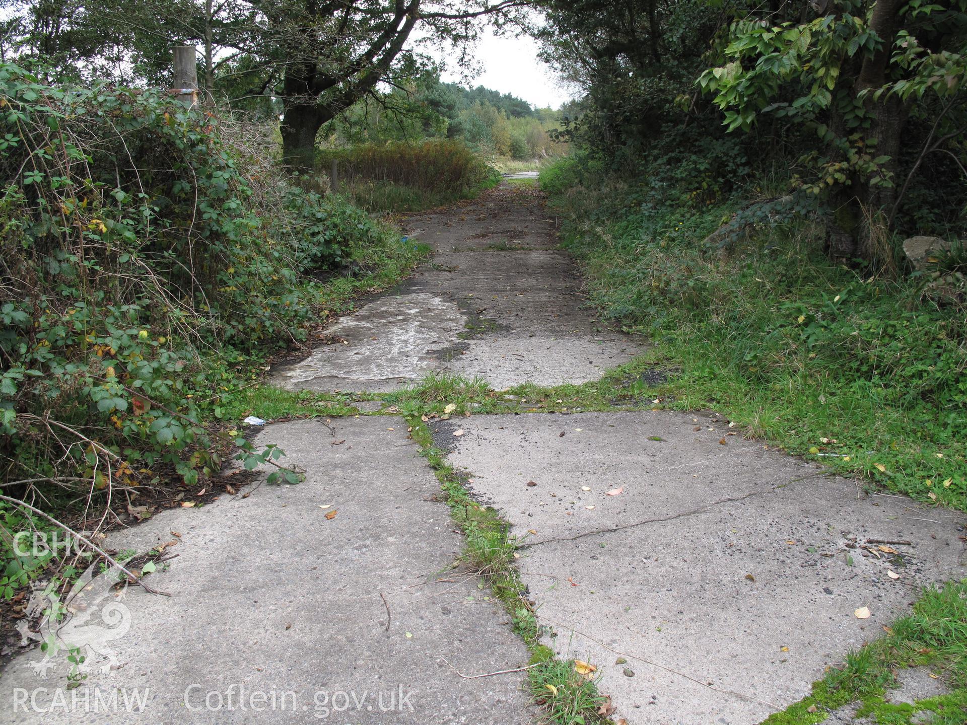 Old roadway northeast off 17th Avenue Hirwaun ROF, from the southwest, taken by Brian Malaws on 08 October 2010.