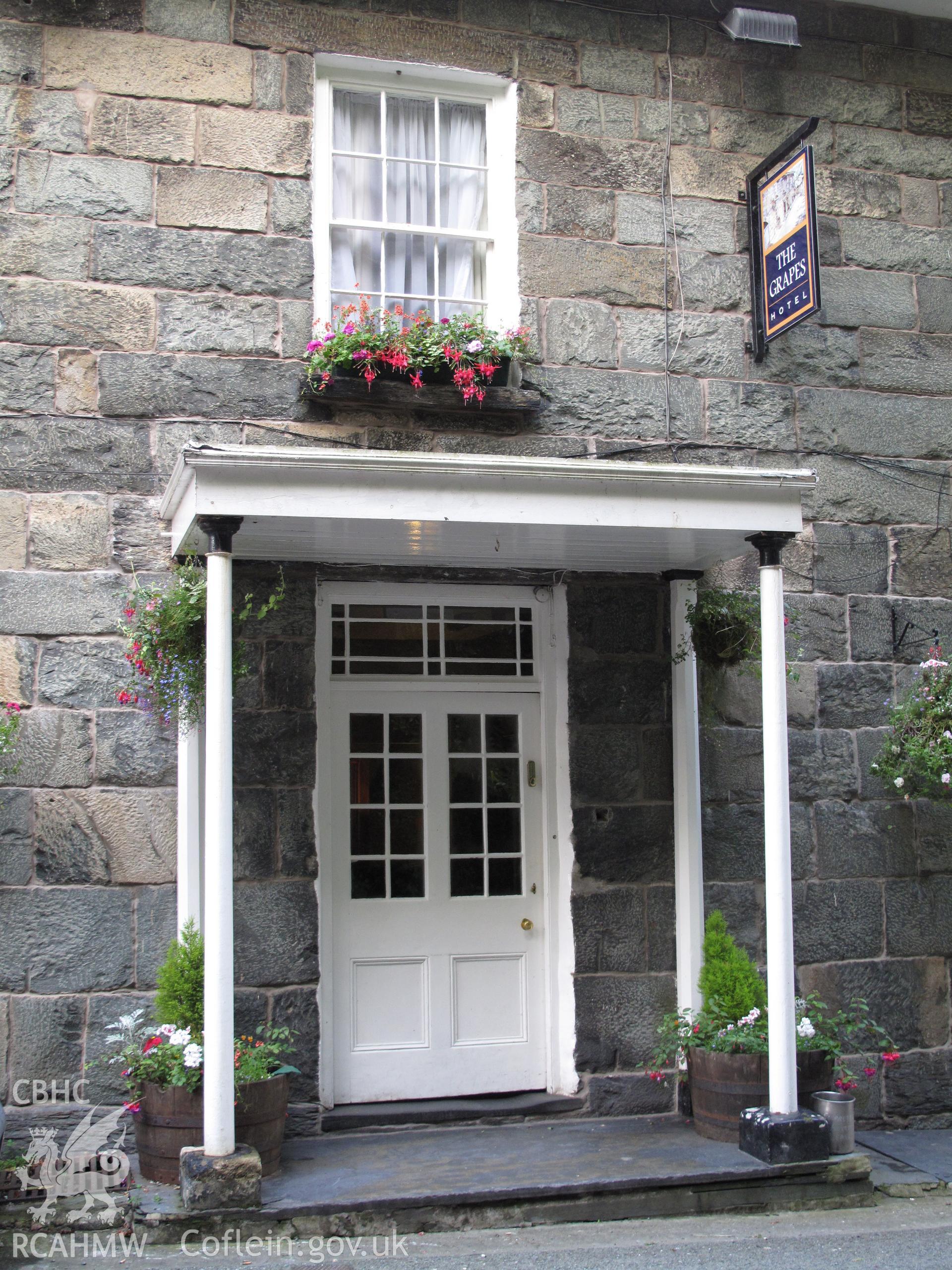 Main door and porch of the Grapes Hotel, Maentwrog, taken by Brian Malaws on 06 August 2009.
