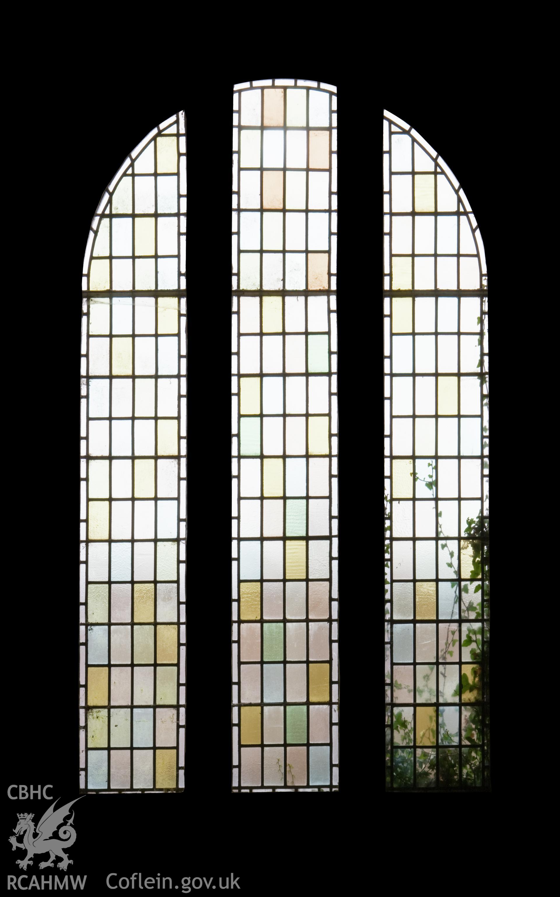 Decorative glass to south wall.