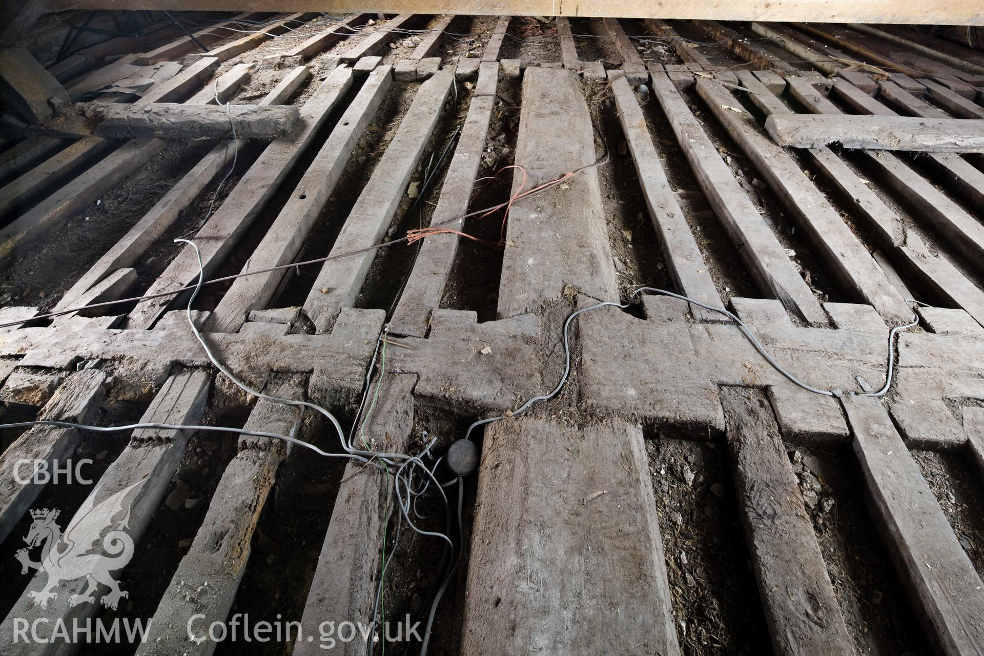 Dovetail joint on roof floor timbers.