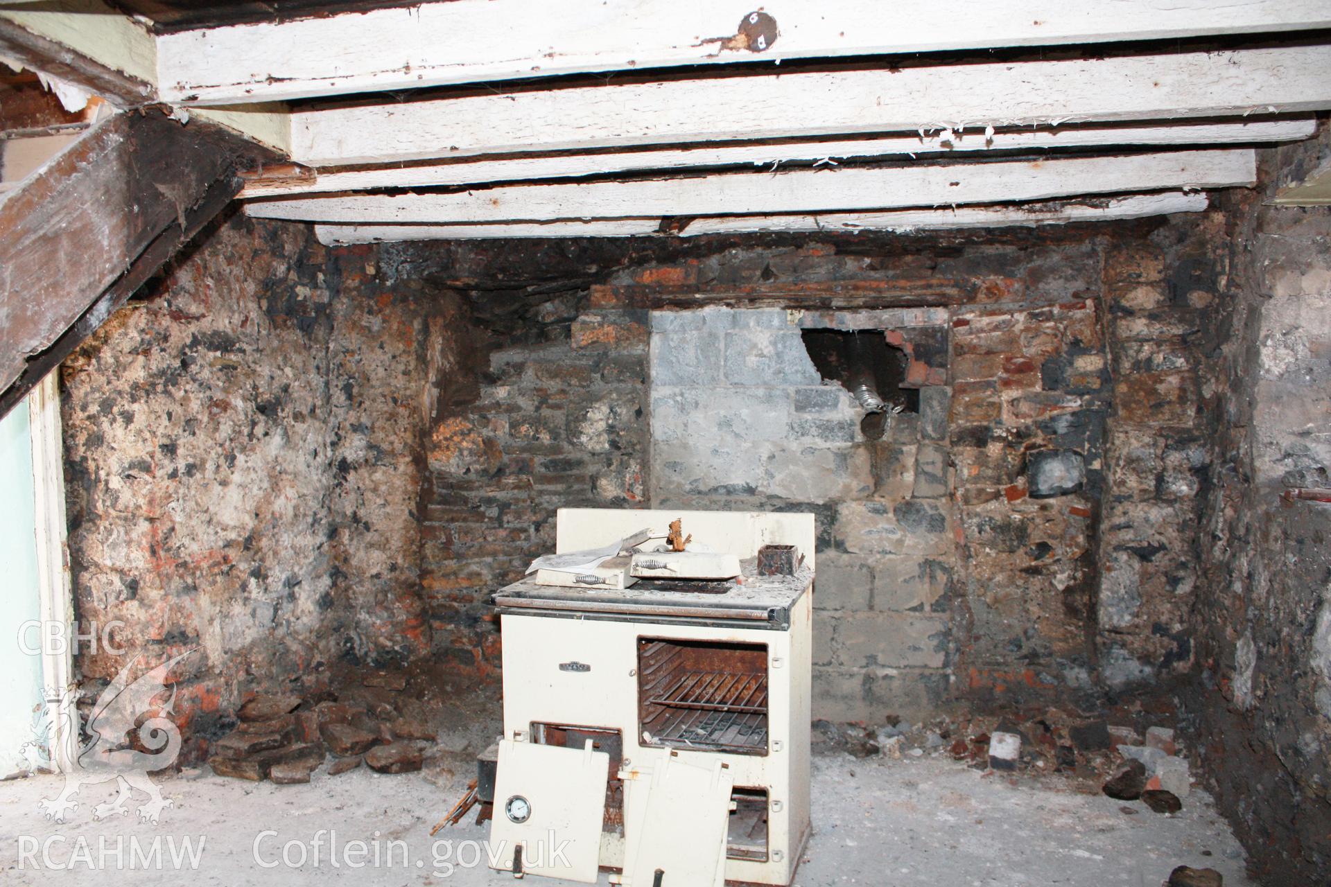Kitchen, end fireplace and ceiling-joists.