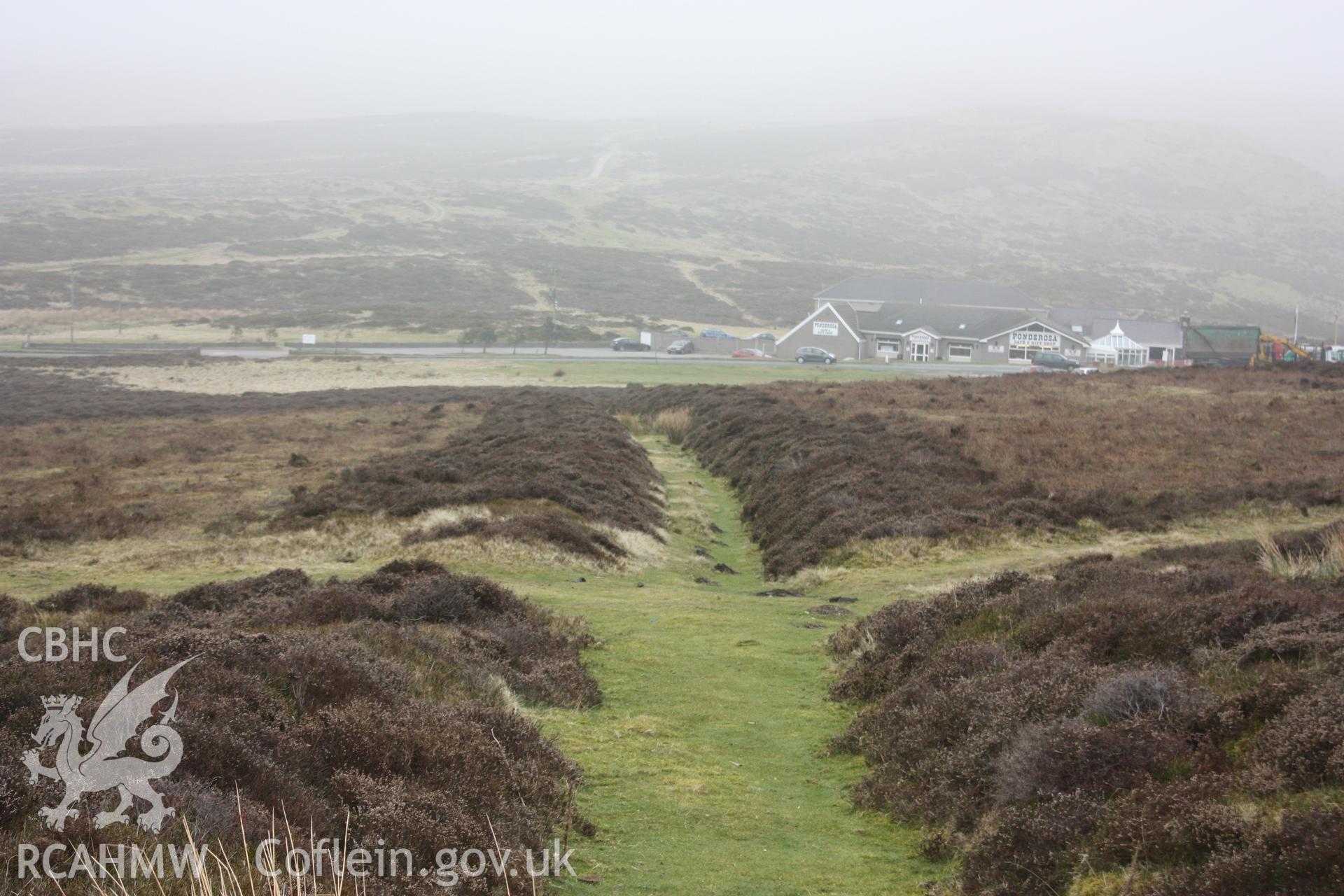 Former tramroad at Moel-y-Faen slate quarry, looking east towards the A542 and Ponderosa Cafe in Horseshoe Pass.