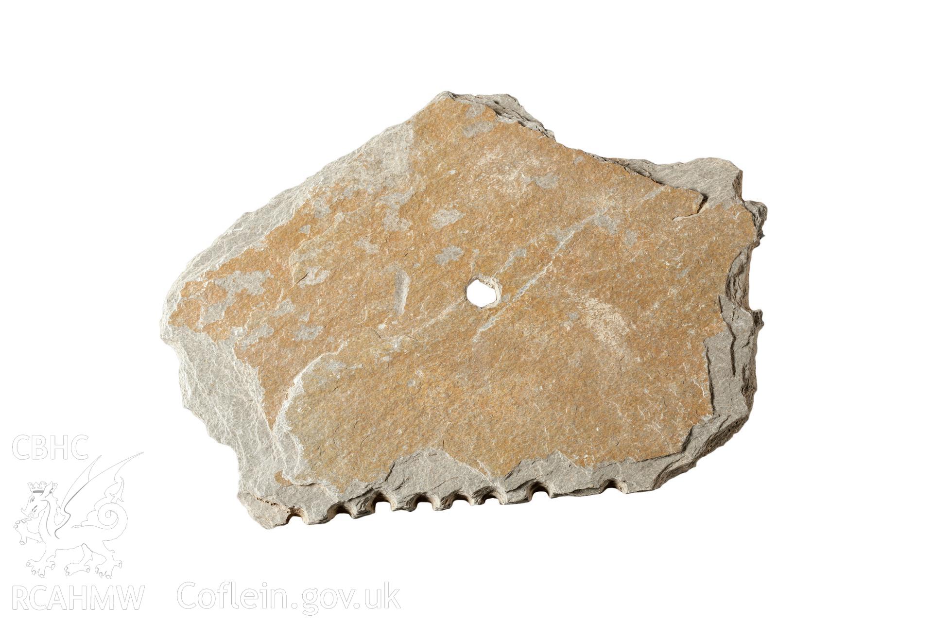 Slate with drilled holes, probably for shaping
