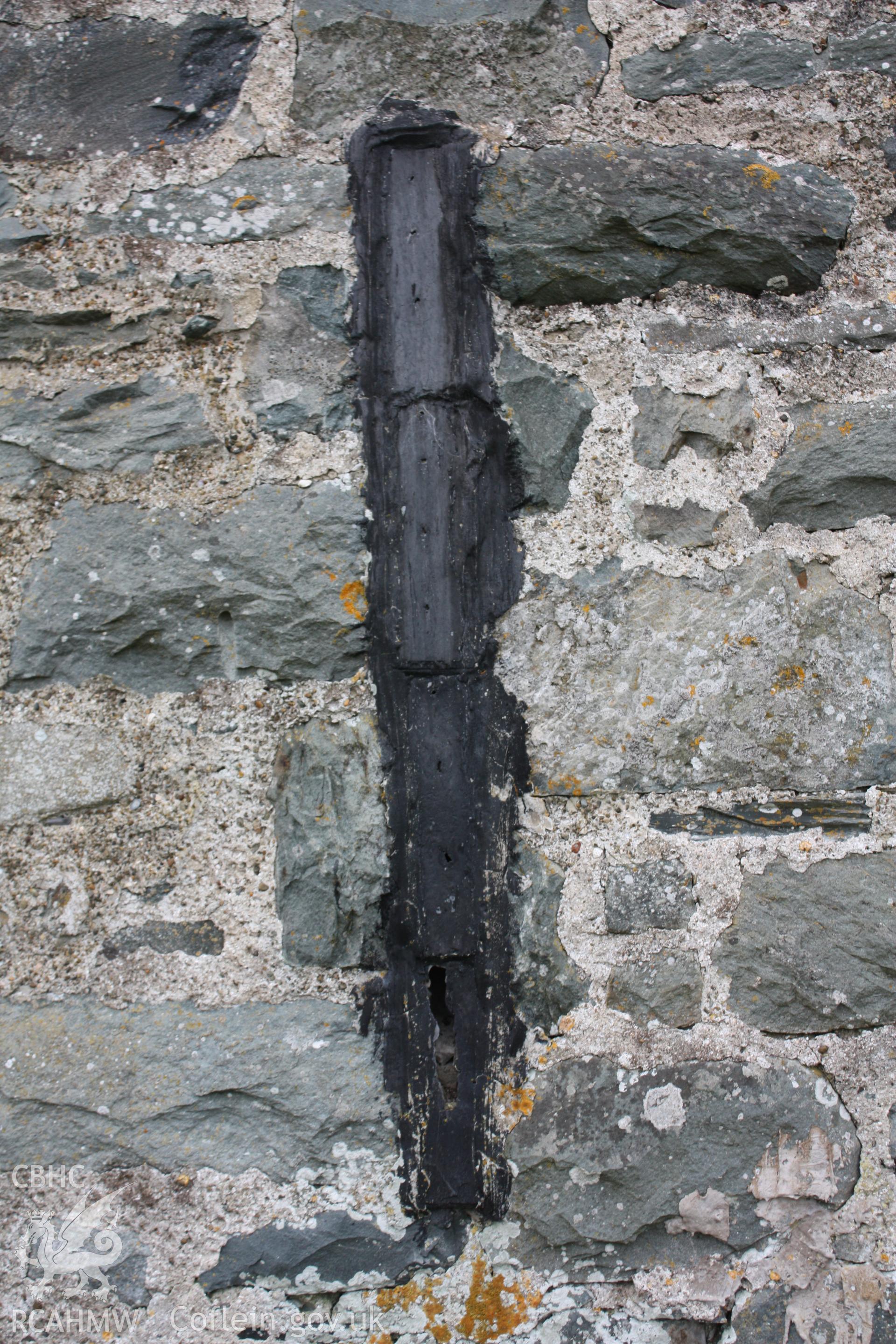 Possibly slot for harbour barometer in western wall of former warehouse