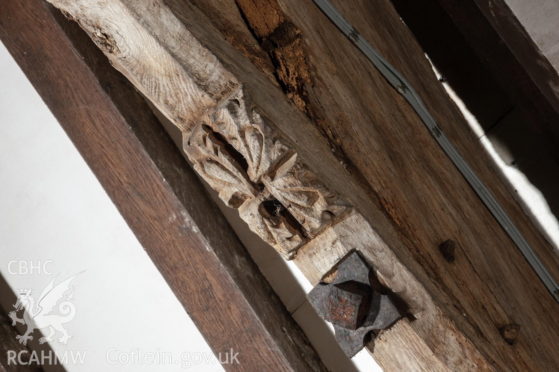 Carved flower on sixth truss