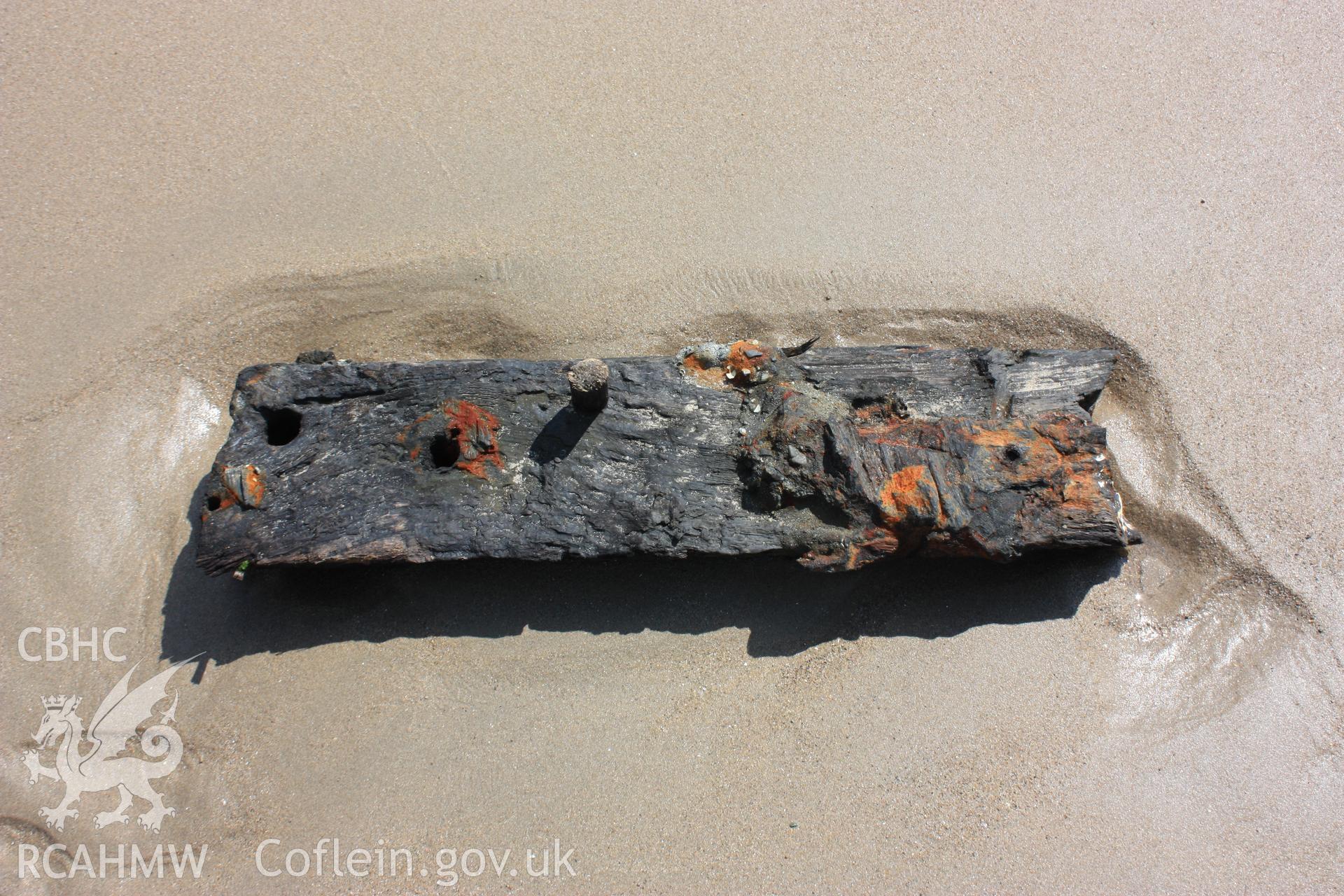 Small disassociated timber lying outside the wreck to the east near the stern