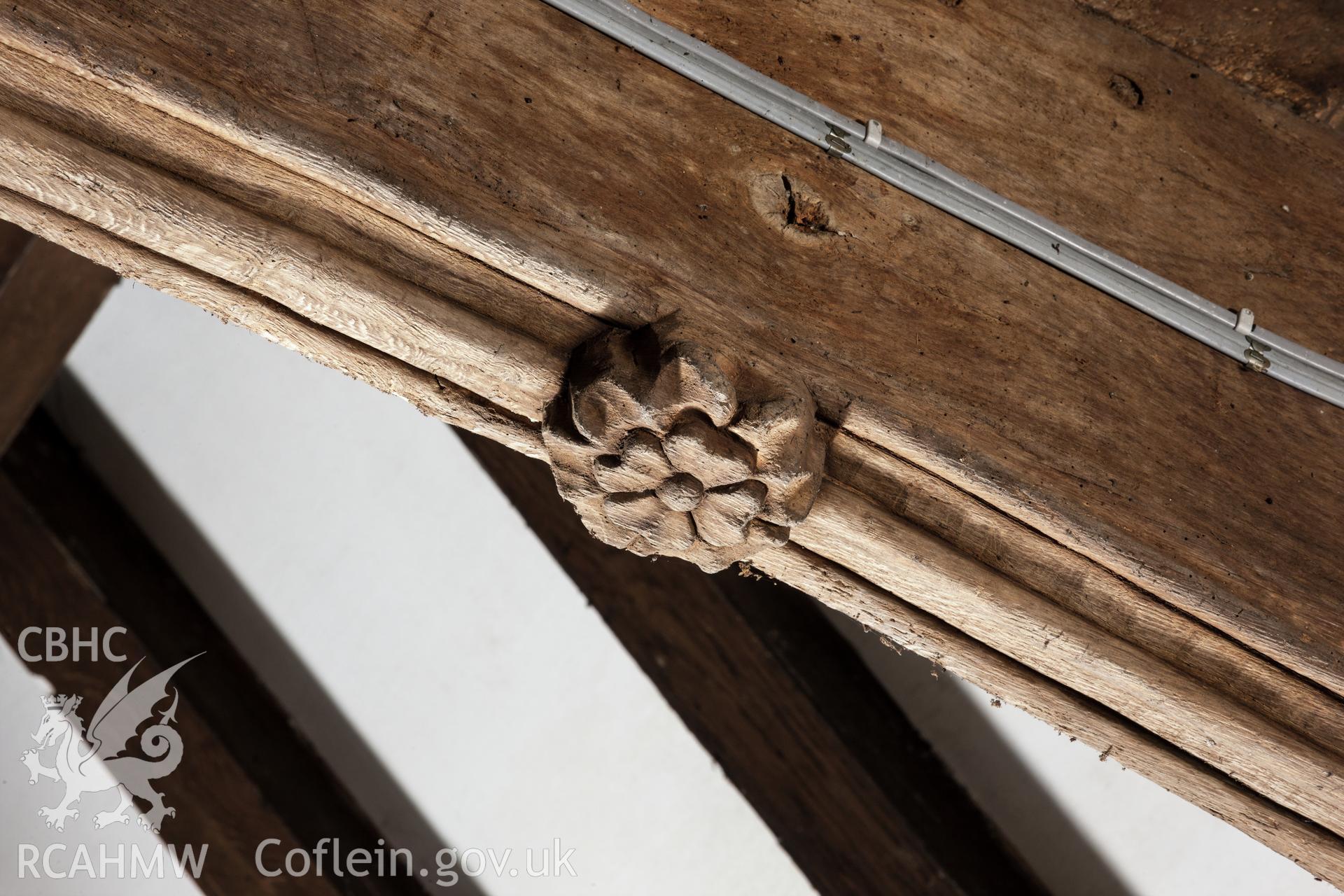 Carved roof boss on third truss