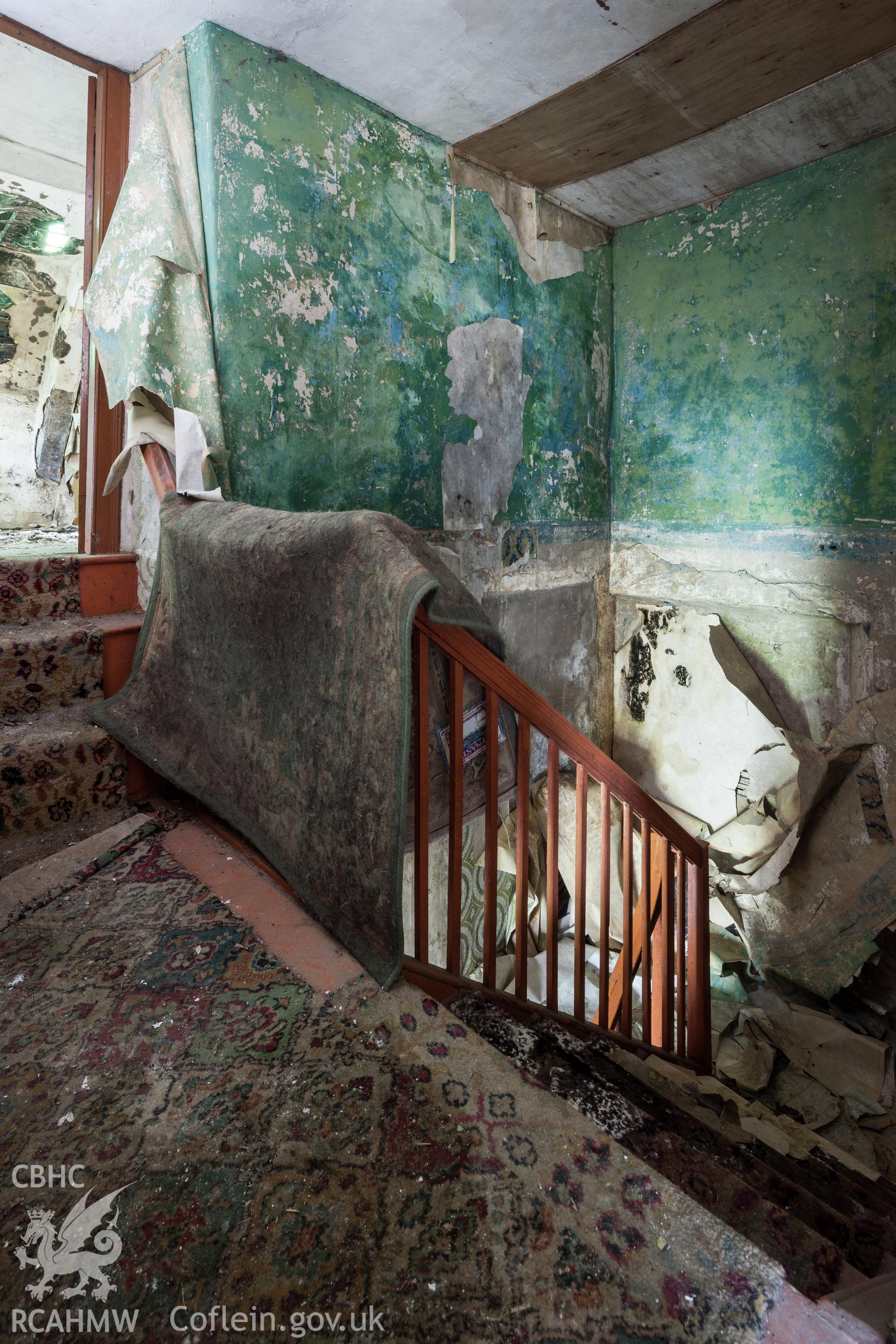 First floor of entrance hall staircase.