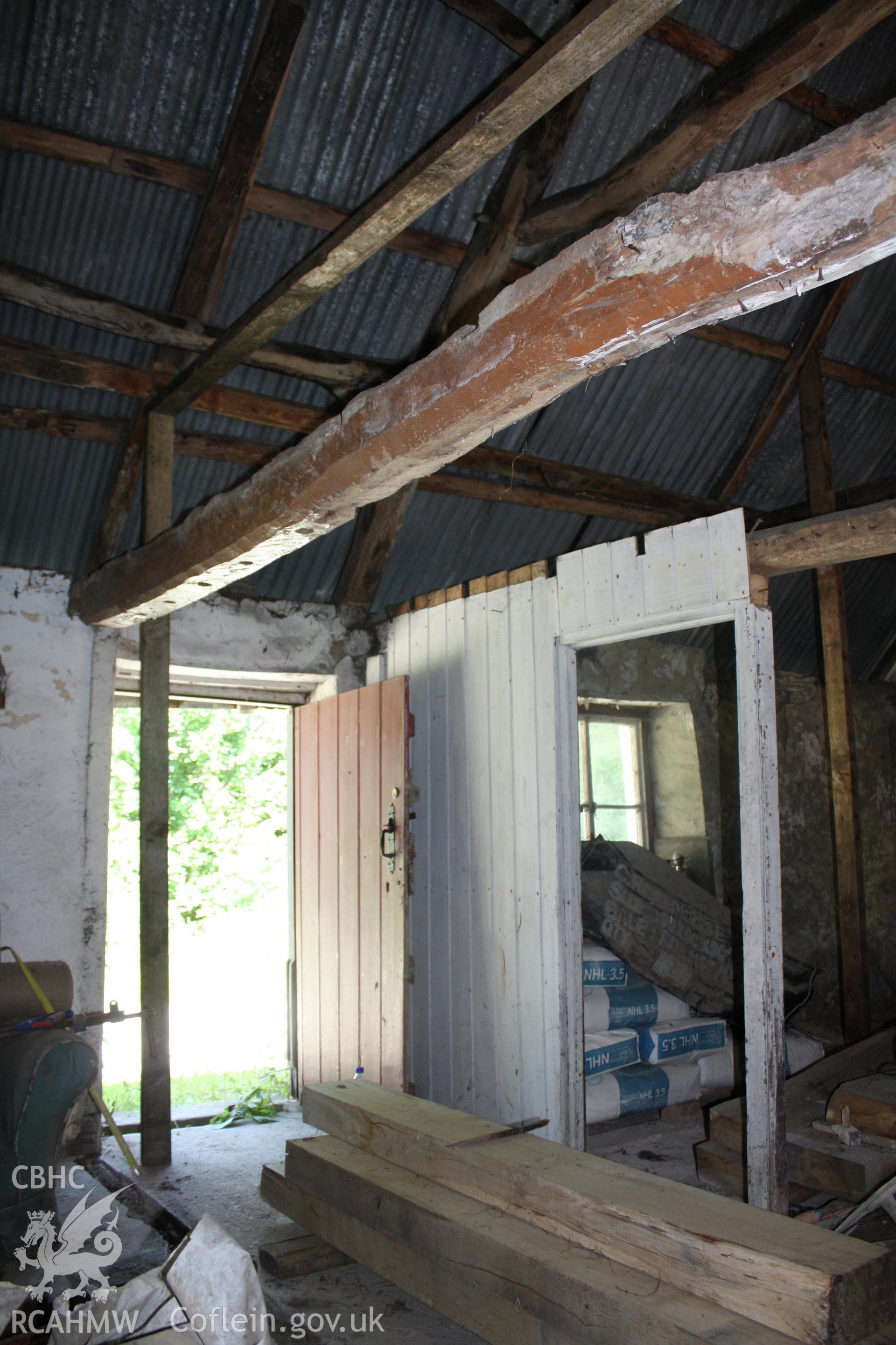 Interior; view toward entrance showing remains of panel partition