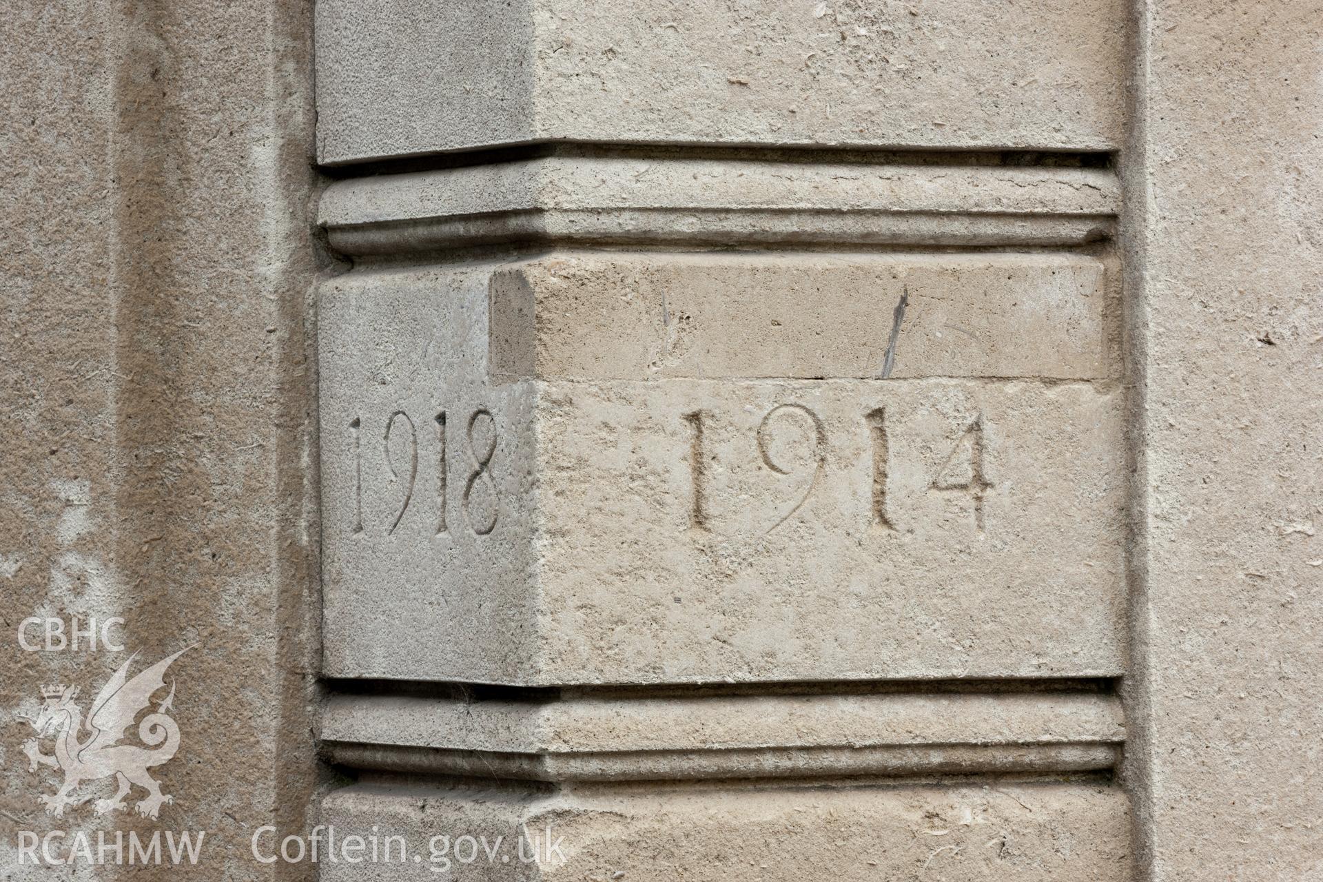 Detail of original date inscriptions, with repair