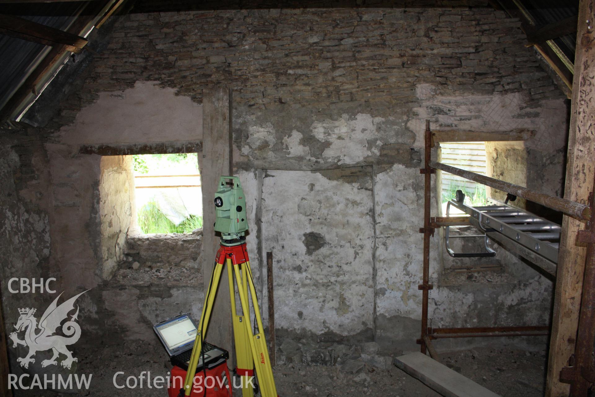 Interior; view towards east gable, showing blocked doorway