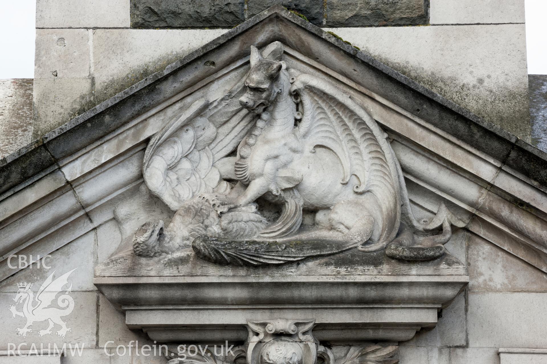 Carving of Welsh dragon on German eagle