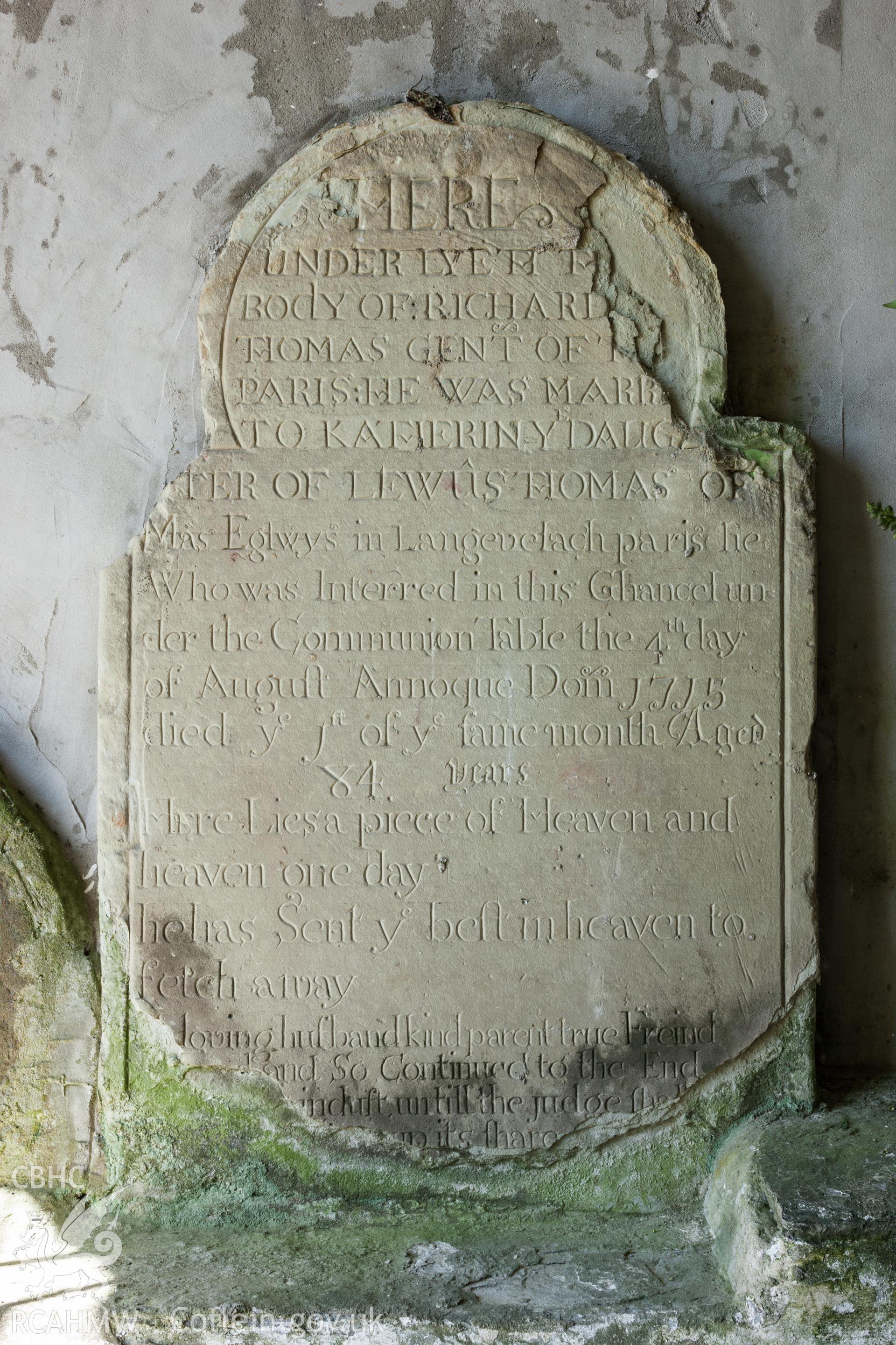 Gravestone in porch