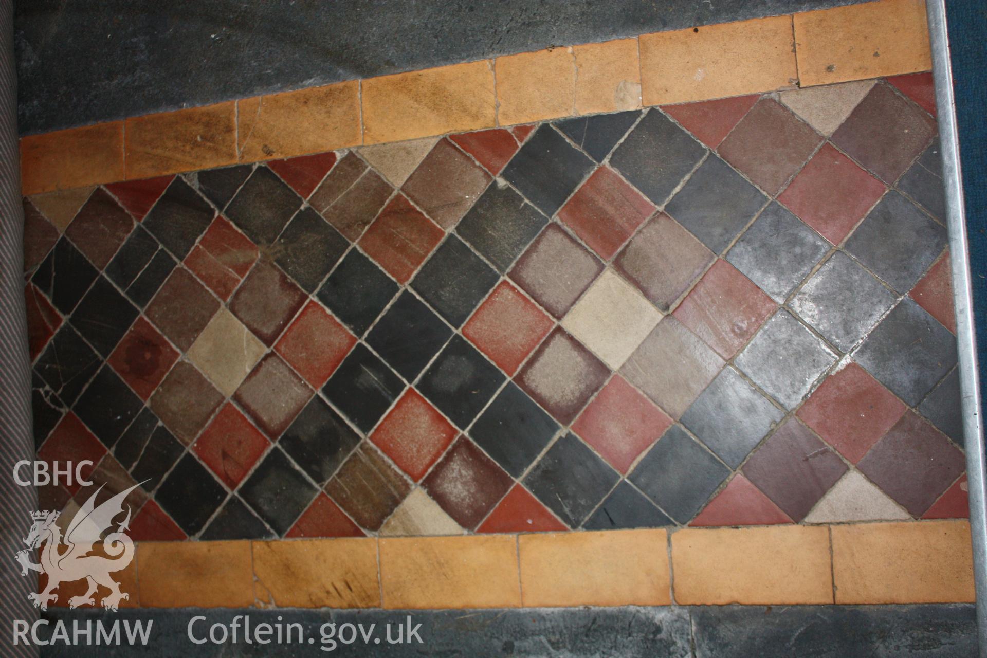 Detail of tile floor at entrance door