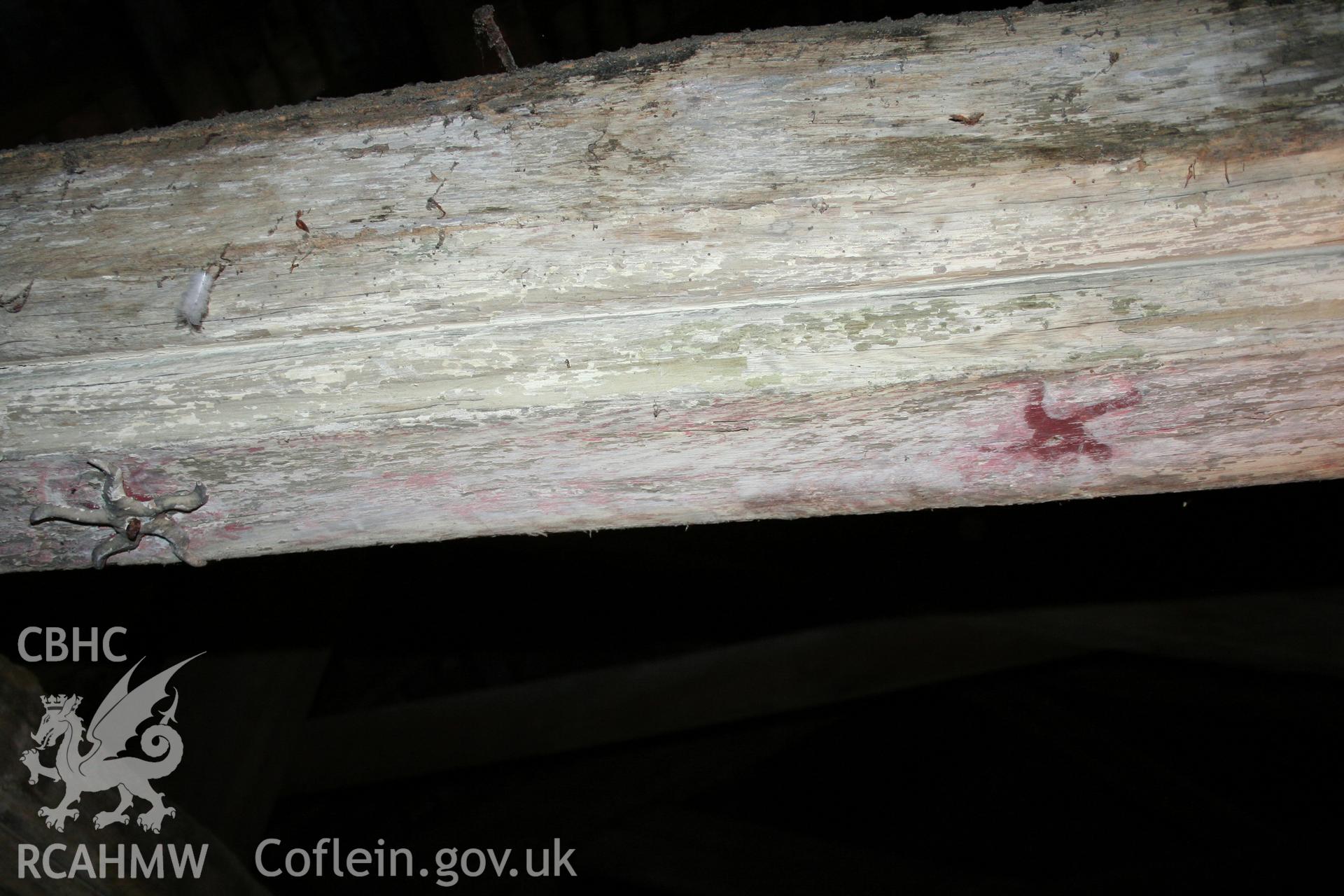 Central purlin showing star and red paint