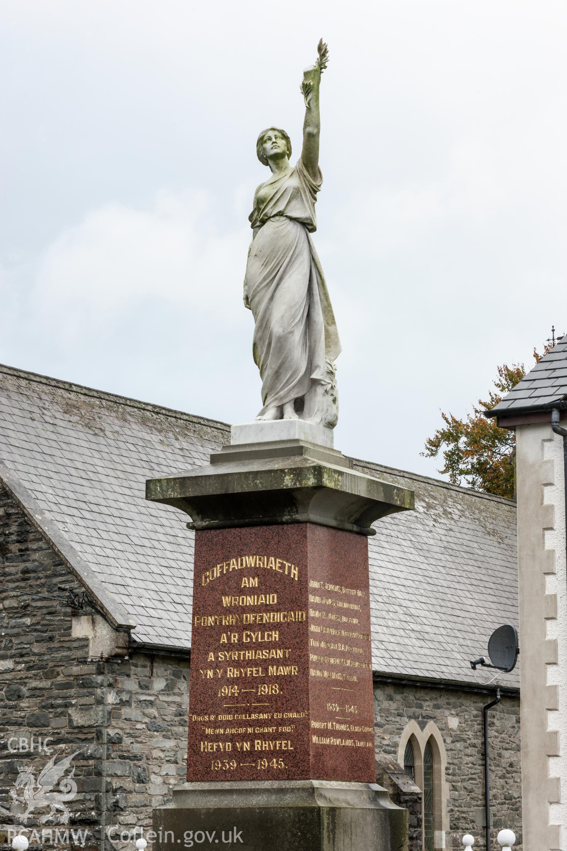Figure and plinth from the northeast