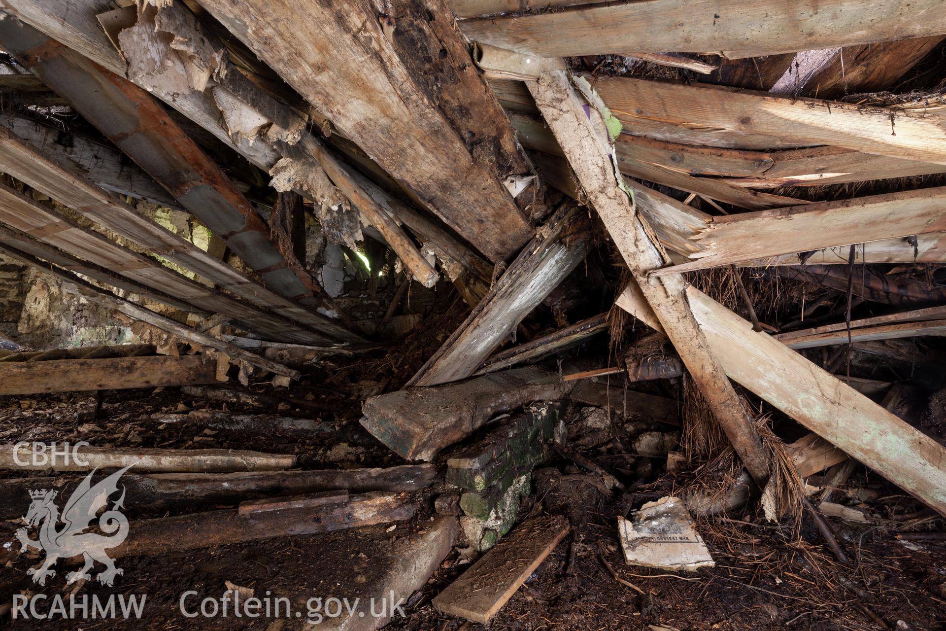 Interior of collapsed building, detail of panel