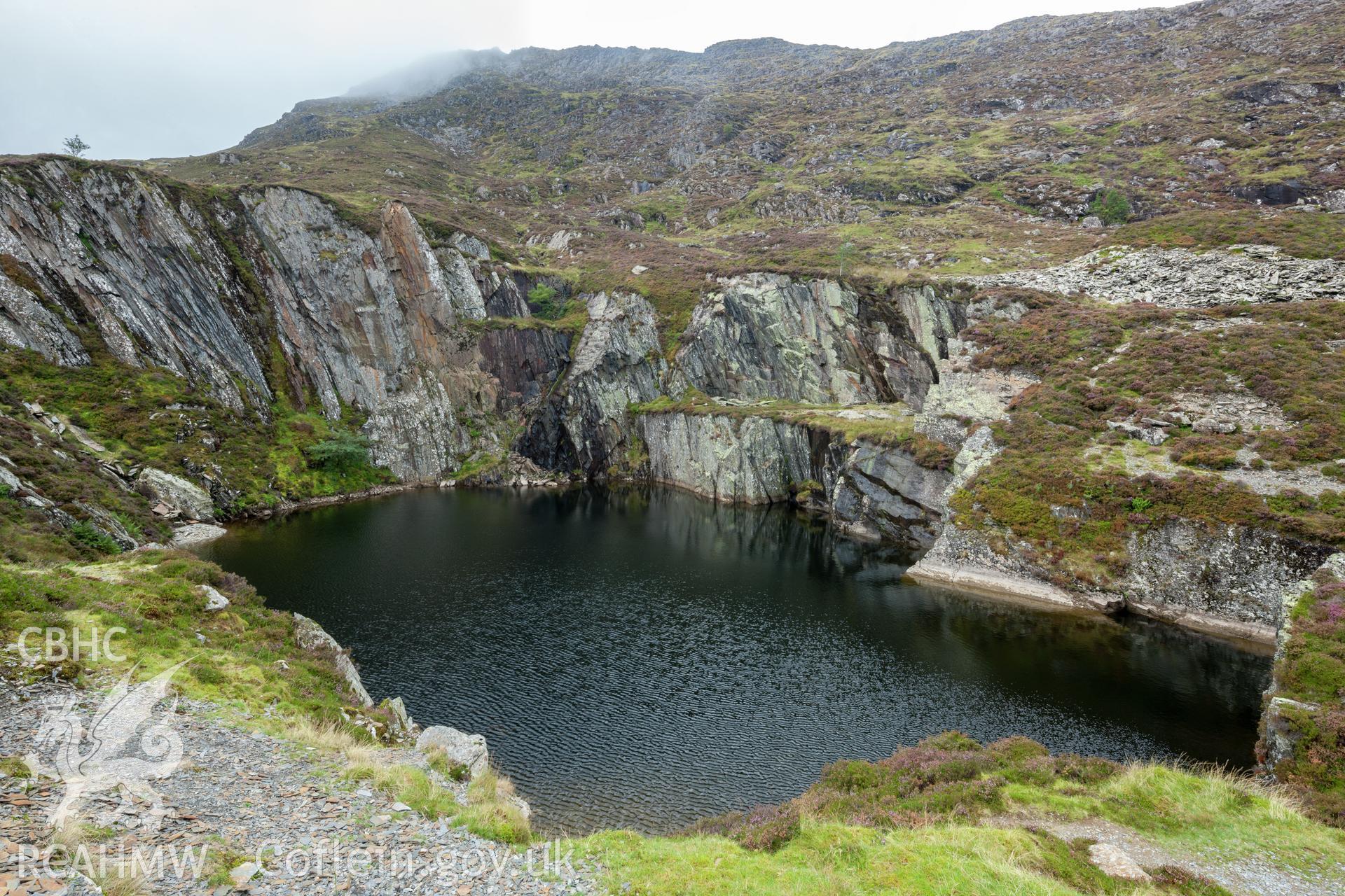 Flooded quarry pit from the east