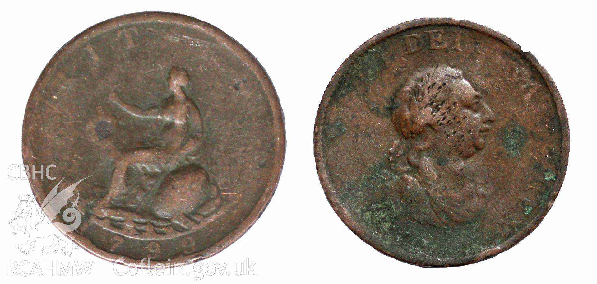 Copper halfpenny found on first floor rear bedroom floor joist, dated 1799 with Britannia and George III (1760-1820) on faces. Obverse: GEORGIUS III  DEI GRATIA REX. Reverse: BRITANNIA, 1799