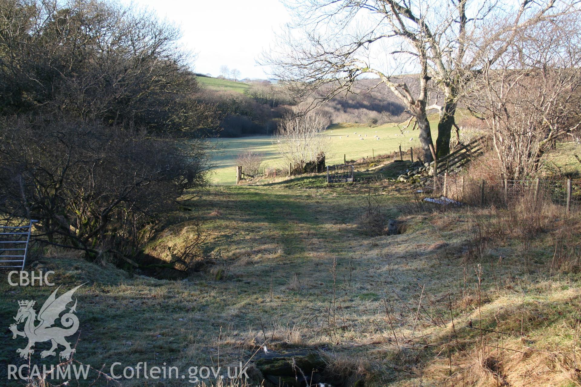 Landscape setting of house site, from the east.