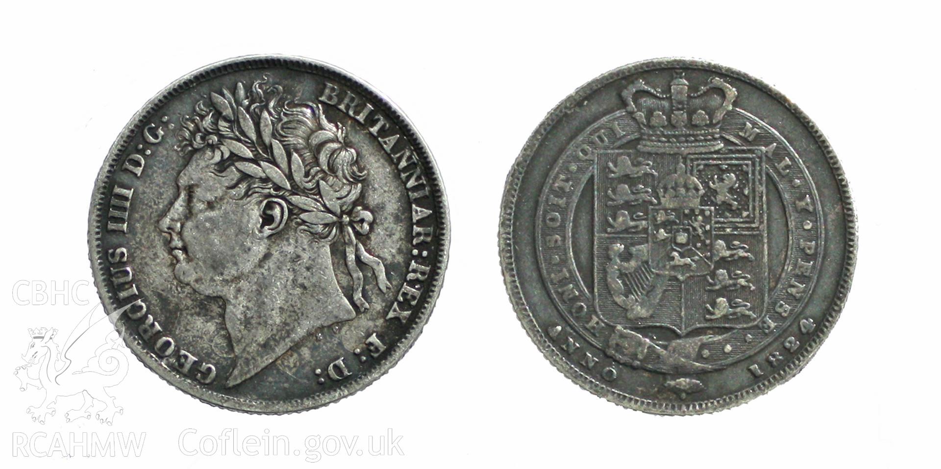 Silver shilling found under floorboards, dated 1824 with George IIII (1762-1830) and shield on faces. Obverse: GEORGIUS IIII D:G: BRITANNIAR:REX F:D: . Reverse: HONI.SOIT QUI MAL . Y PENSE ANNO 1824