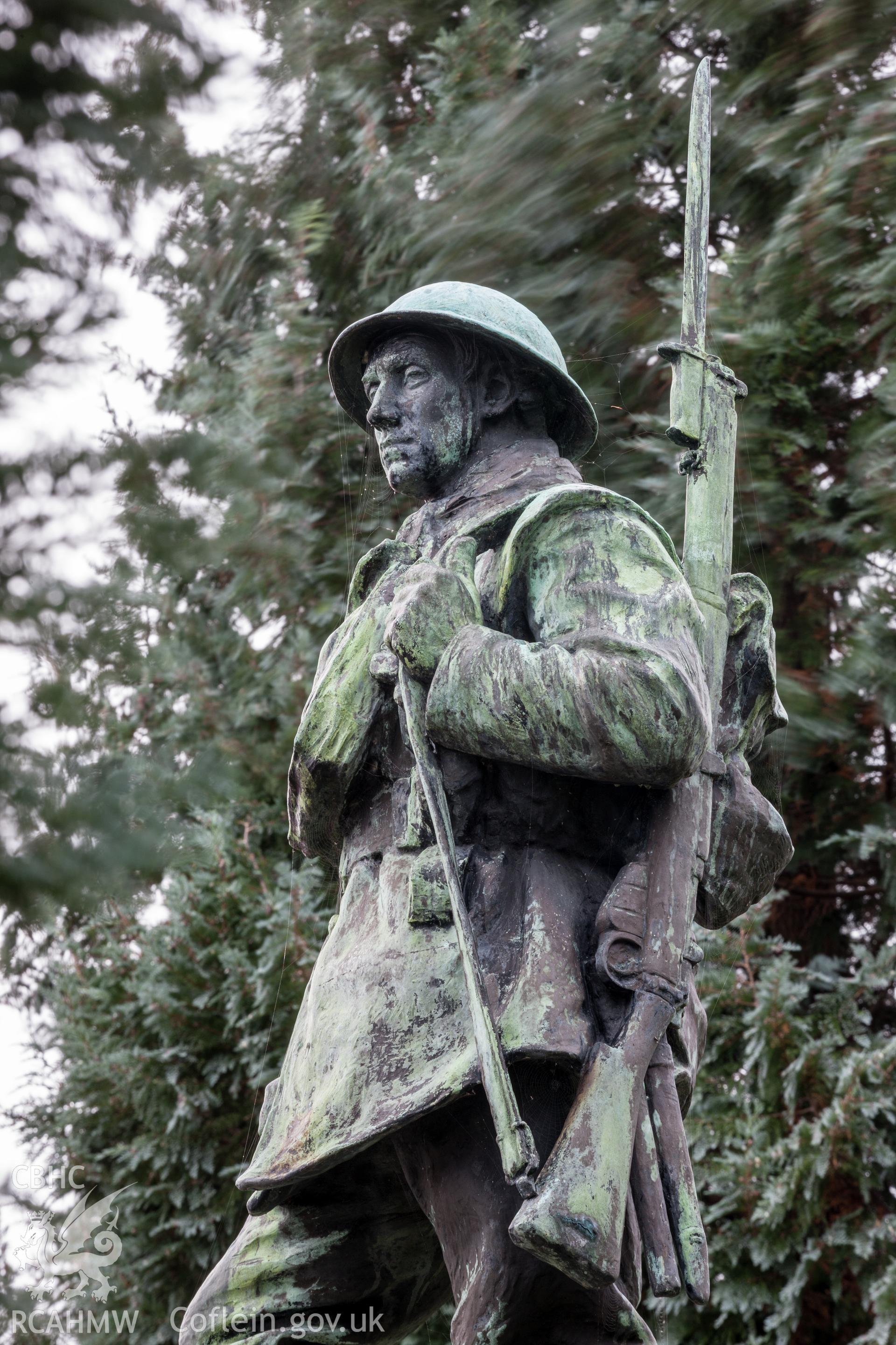 Detail, figure from the north northeast.