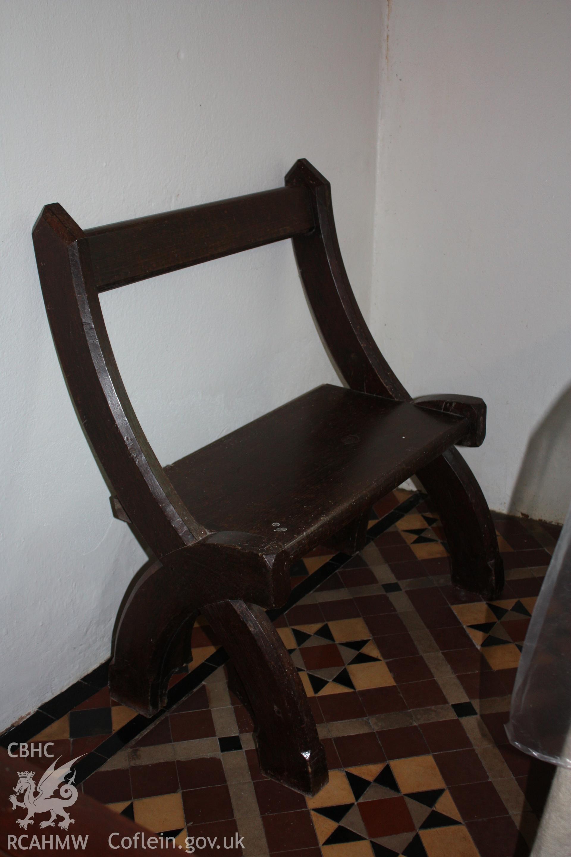 Wooden chair on high altar platform