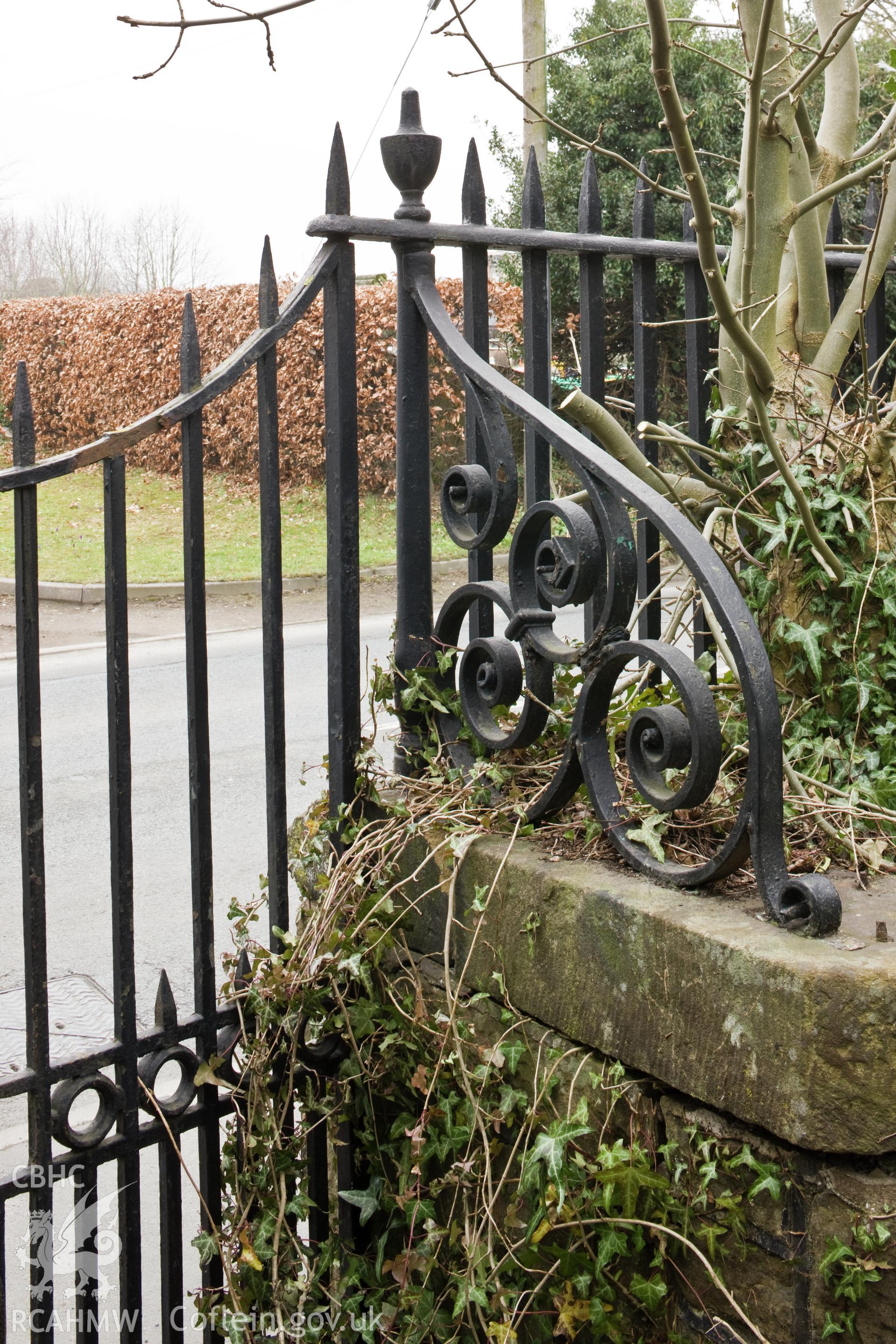 Detail of cast-iron gate, fence and support bracket.