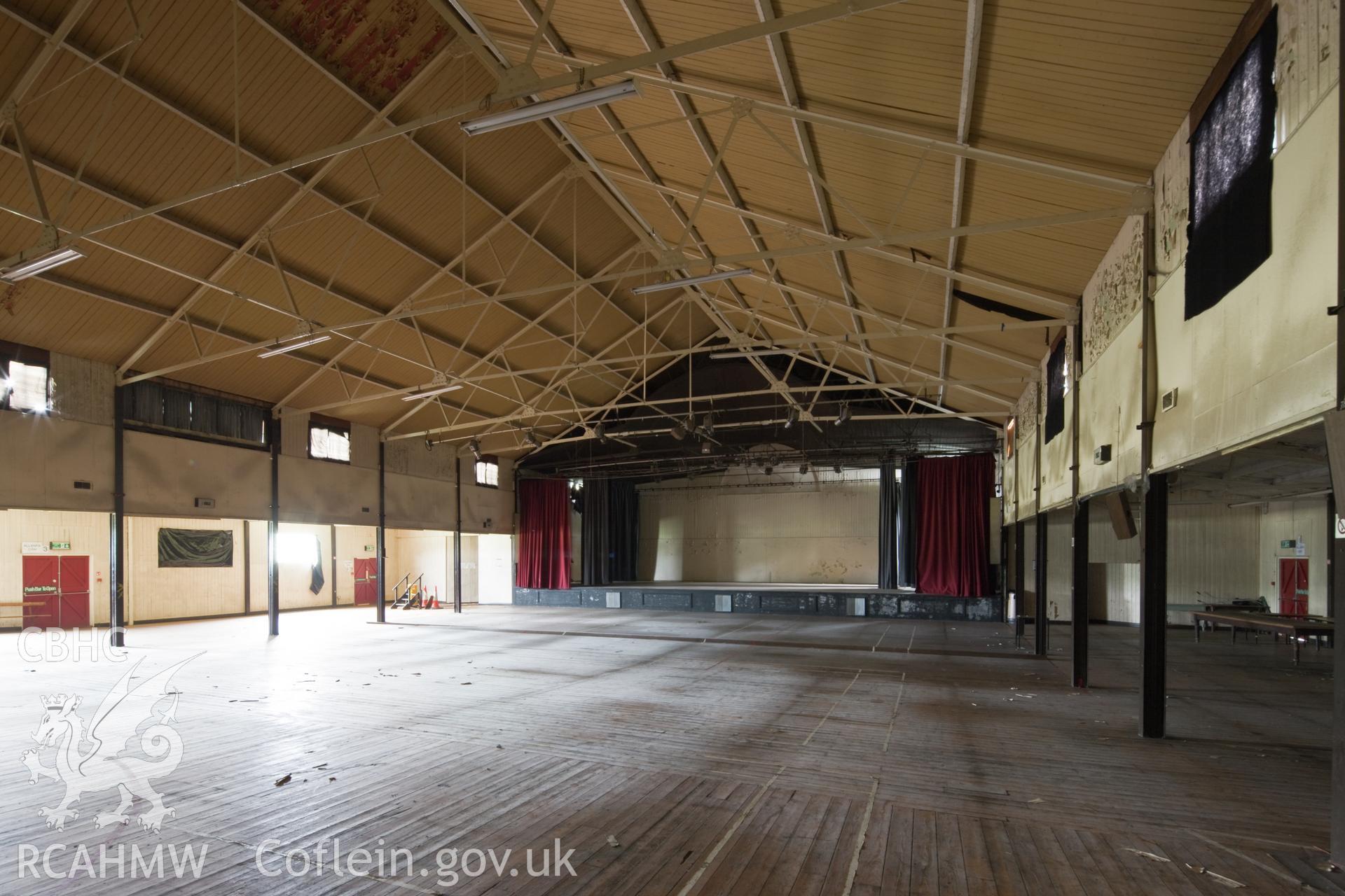 Interior from the southwest looking towards the stage, available light.