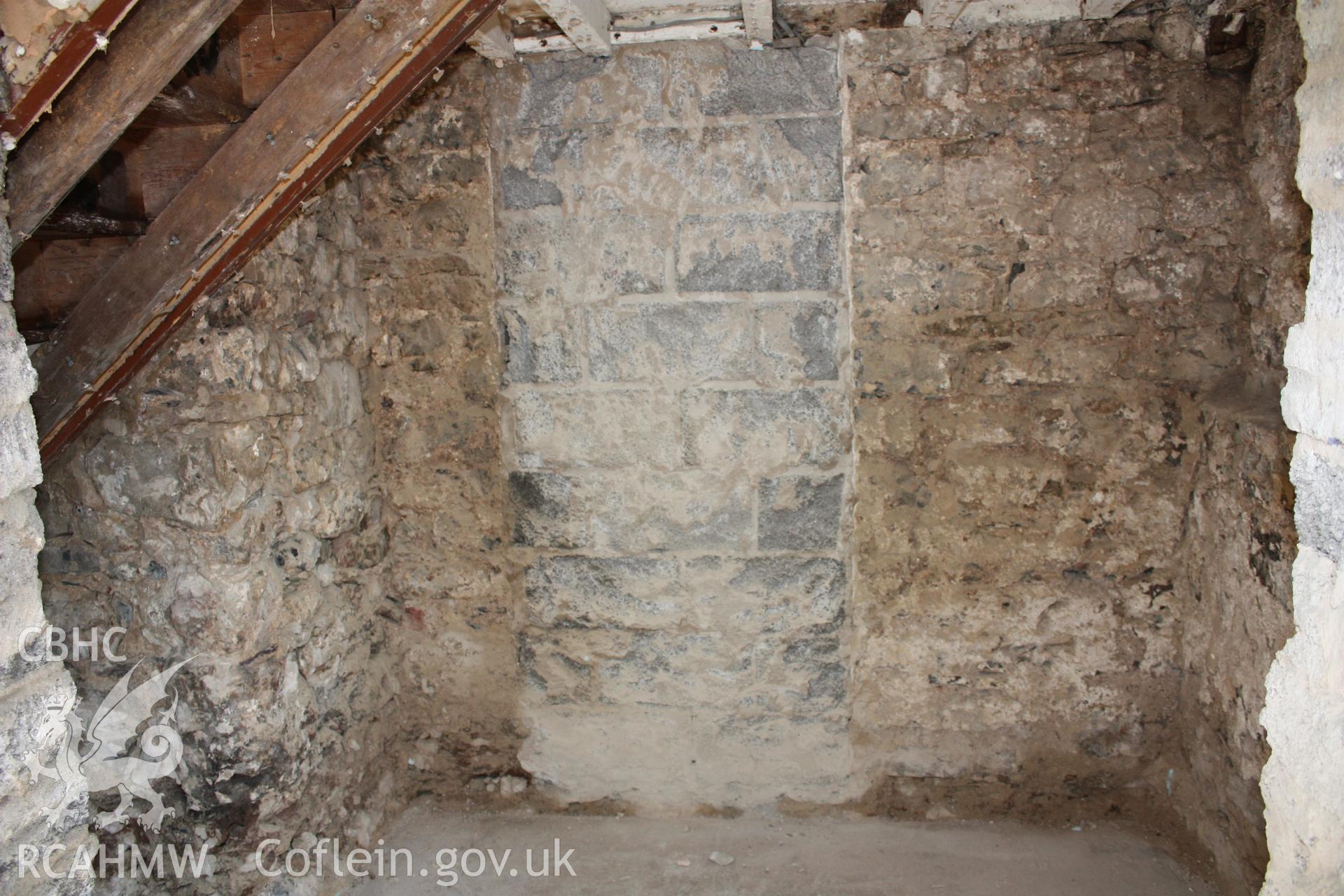Interior of stair projection looking to the blocked doorway from the hall.