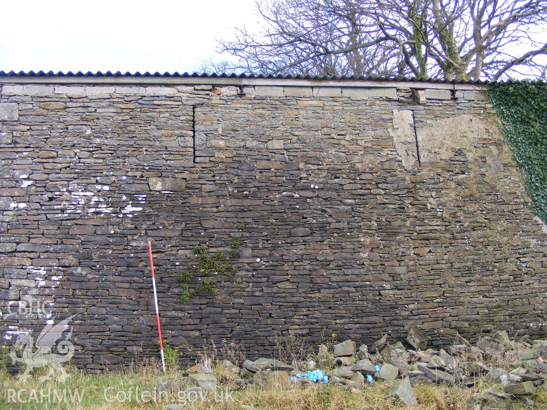 Digital photograph from an archaeological evaluation for a barn conversion and watching brief on a sheepfold at Mynachdy Farm, Ynysybwl December 2008; by S. Mayes and D. Rouse, Archaeological Investigation Ltd.