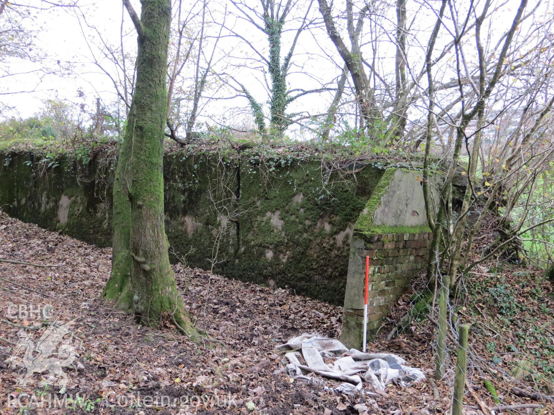 North-east end wall of markers' butt/target area; 1m scale.