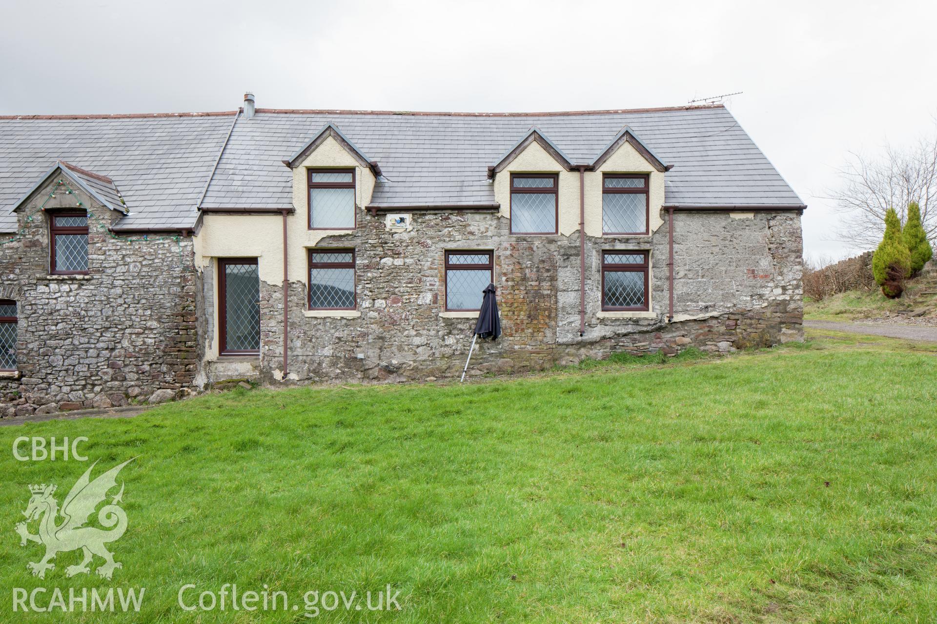 Exterior from the southwest of much altered C19 extension on southeast