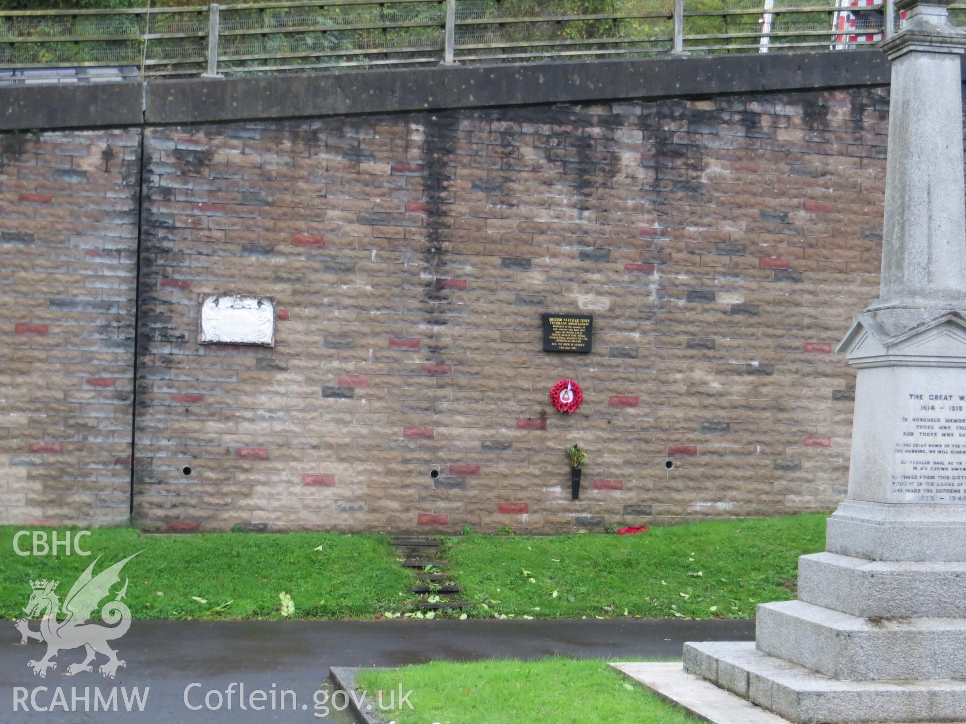 Other memorials attached to rear wall.