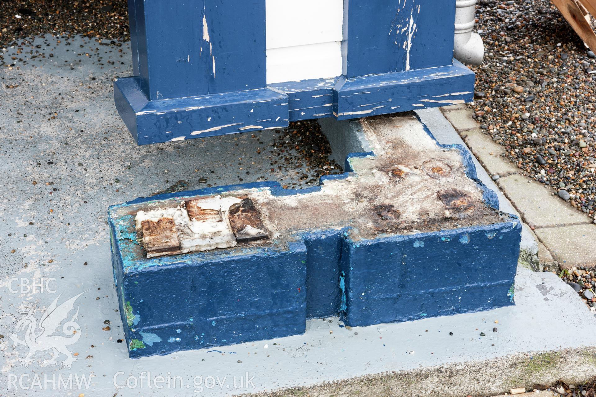 Detail showing construction and damage