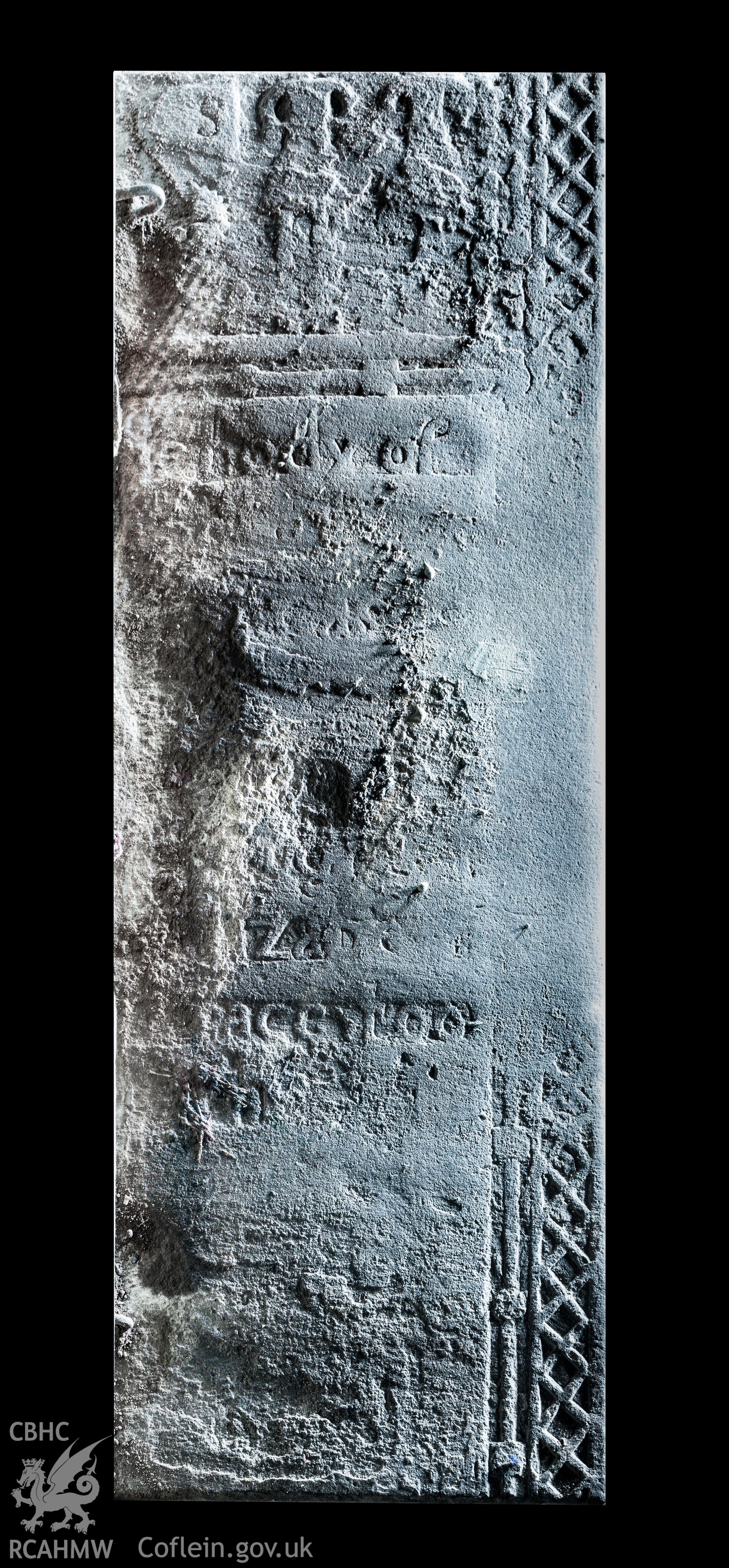 Re-used graveslab as step at base of tower