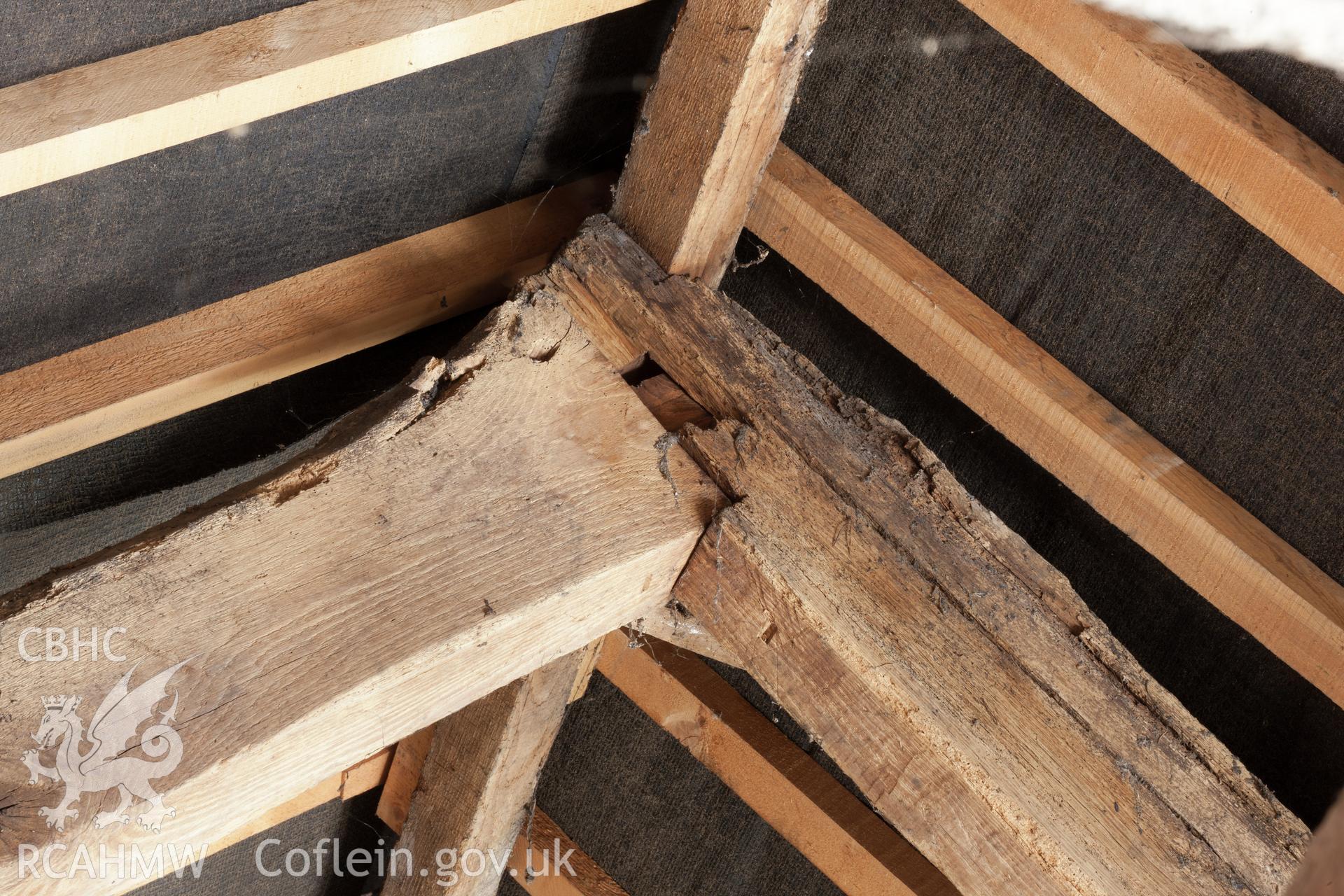 Detail in southeast roof of pegged mortice joint in truss