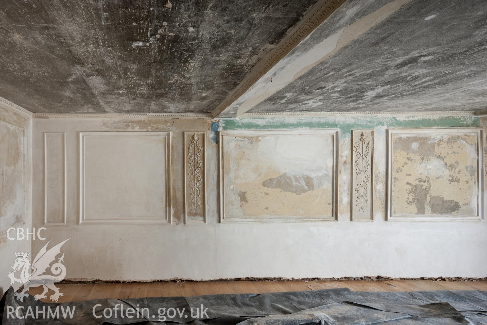 Interior of decorated plaster room, looking northwest