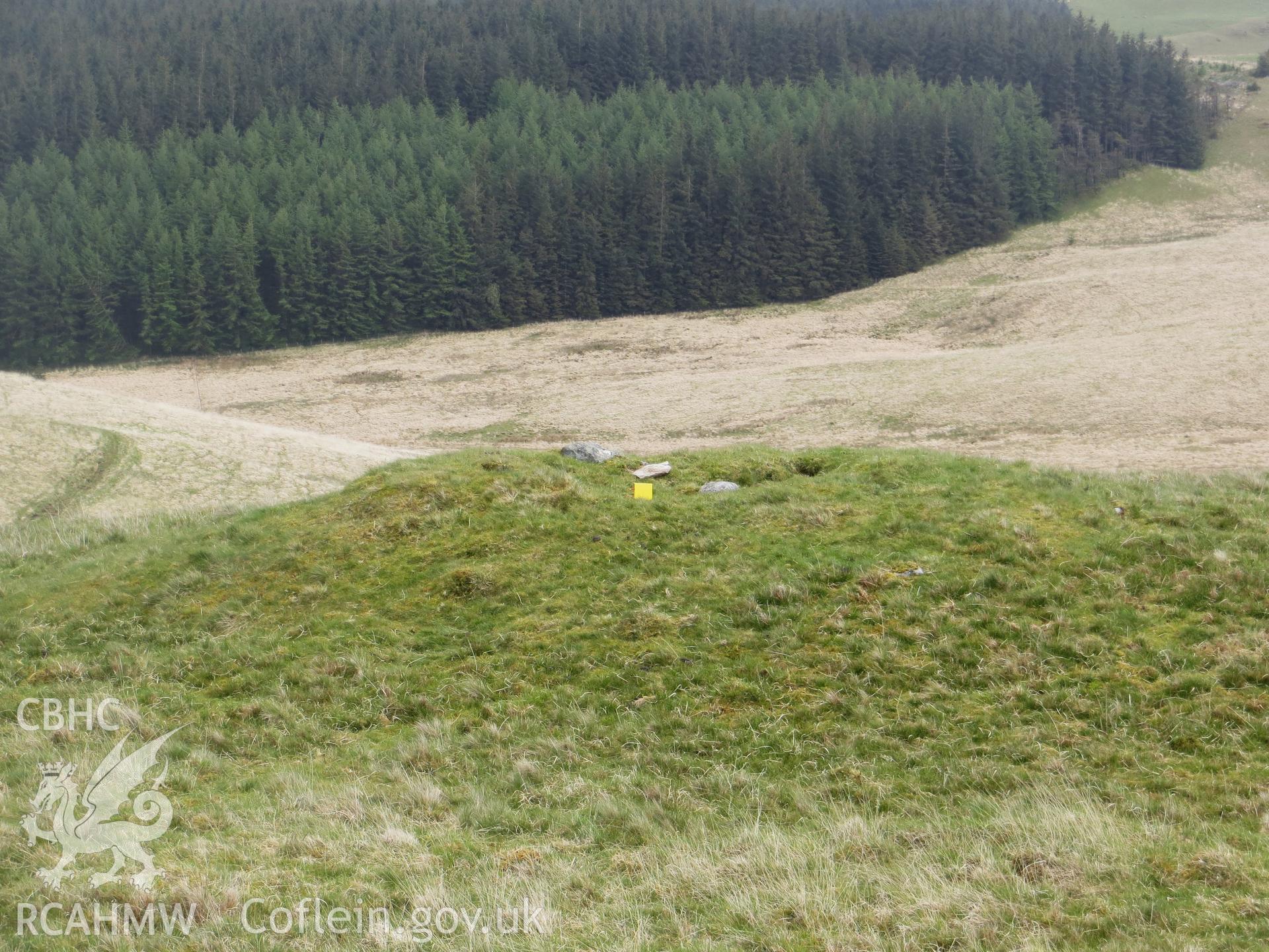 View of cairn from the north-west; note-book scale.