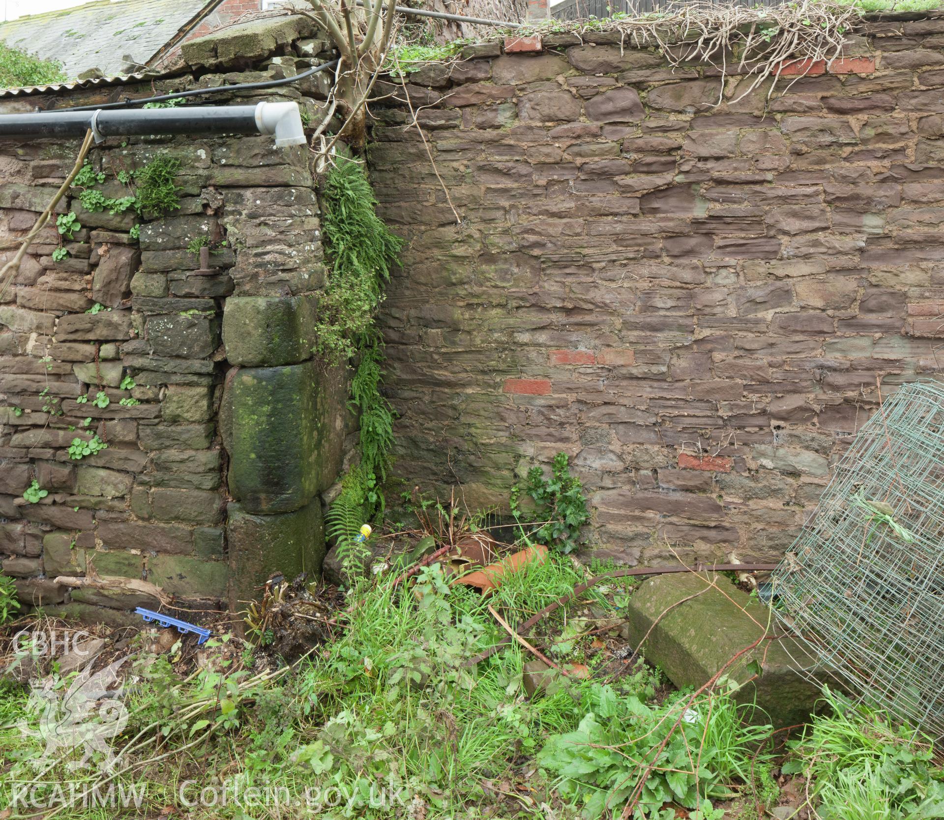 Remains of stone gateway into farm yard