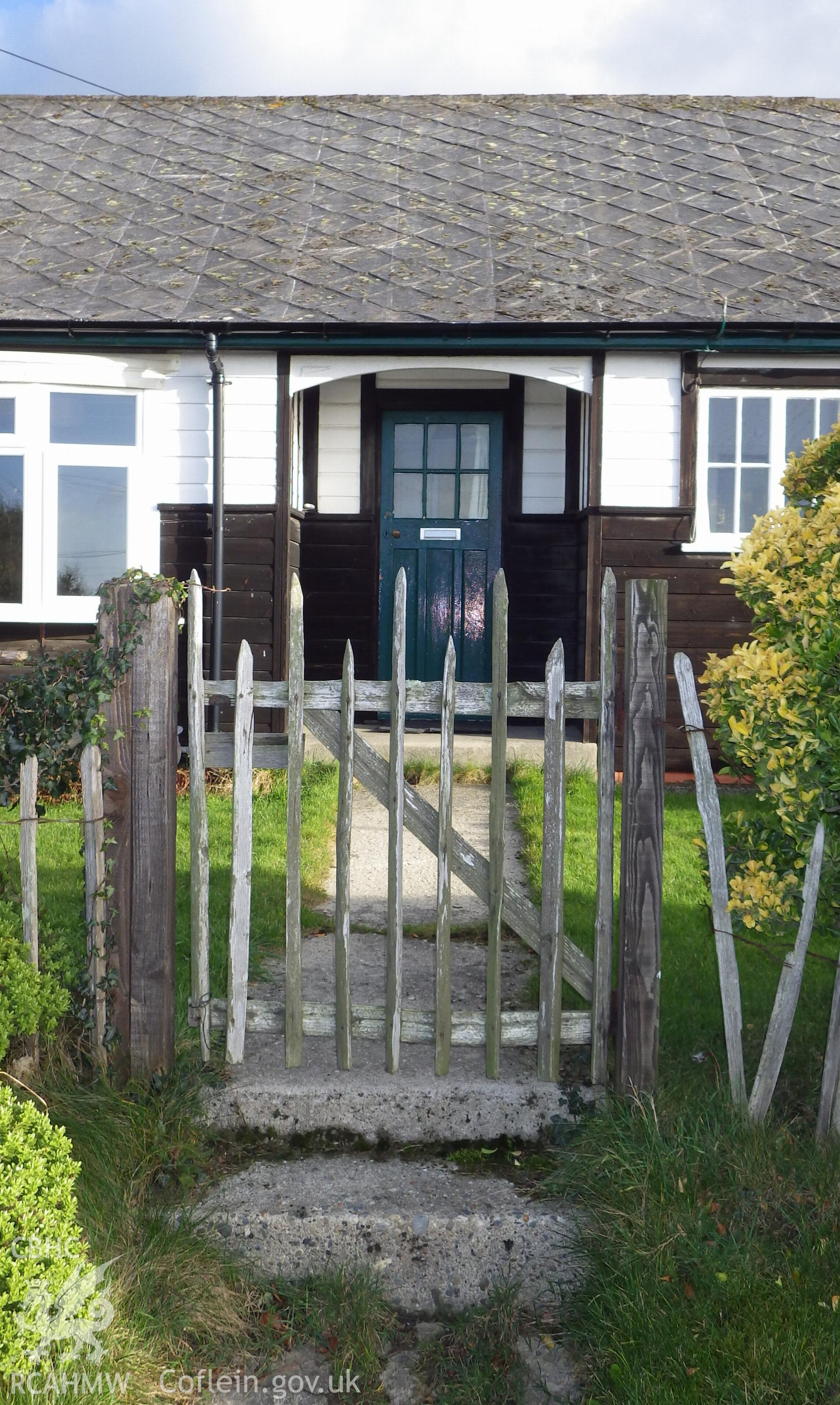 Detail of front door with original timber clad exterior
