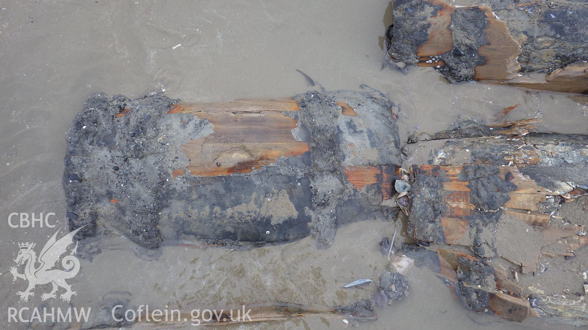 Exposure of metal debris and part of steel hawser
