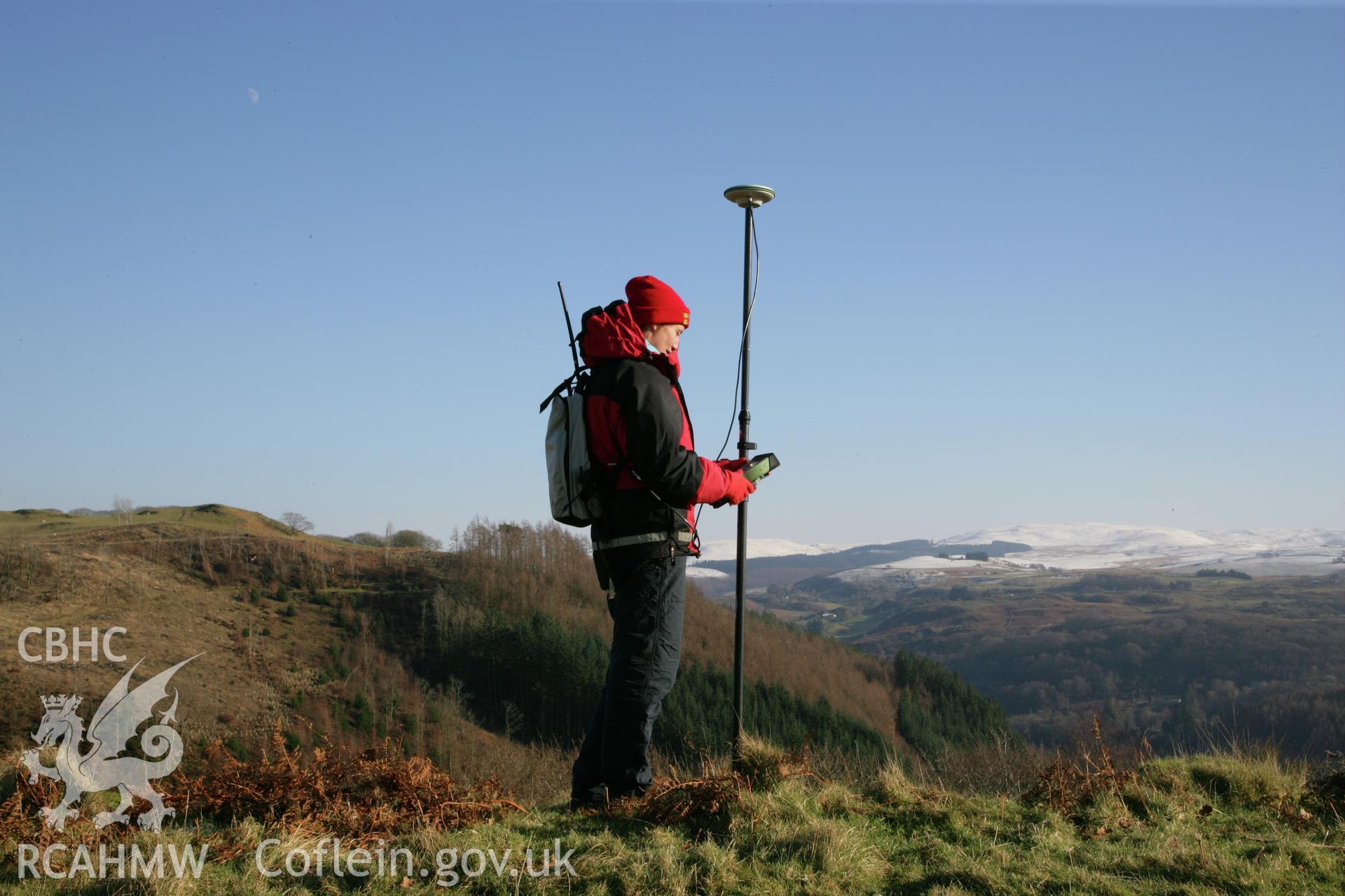 Castell Grogwynion hillfort, Royal Commission survey 2012, Louise Barker surveying on easternmost rampart