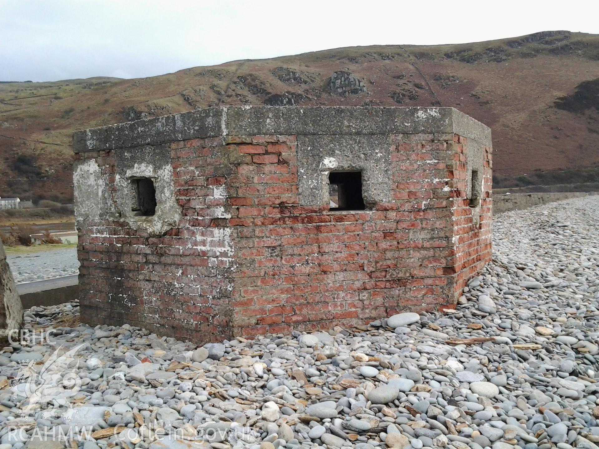 Northwest facing wall of pillbox showing firing loops remaining open.