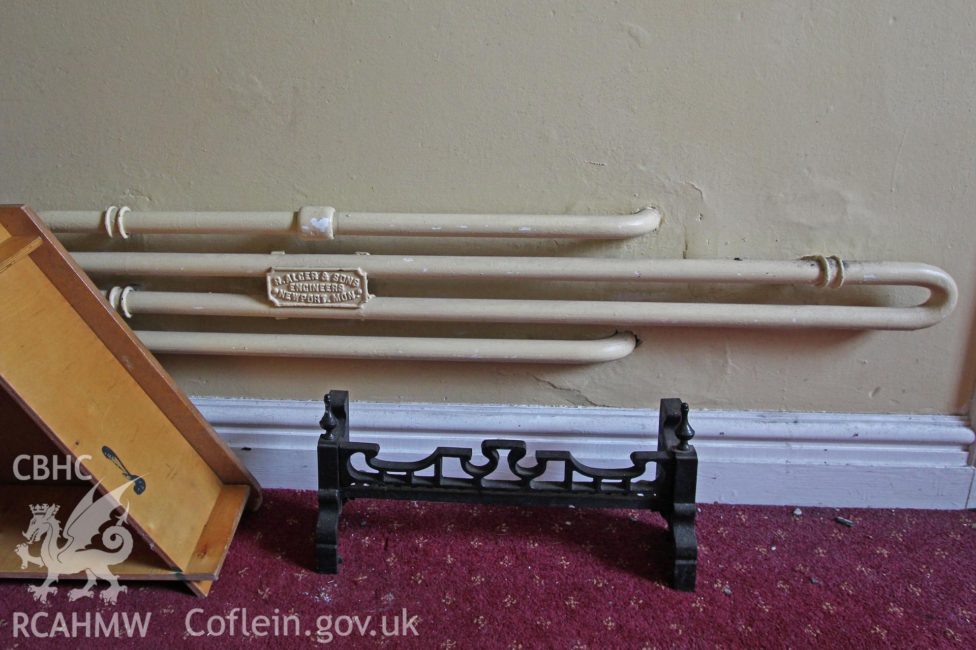 Bethel Independent Chapel, Pen-Clawdd, detail of dis-associated fire grate and heating pipes.