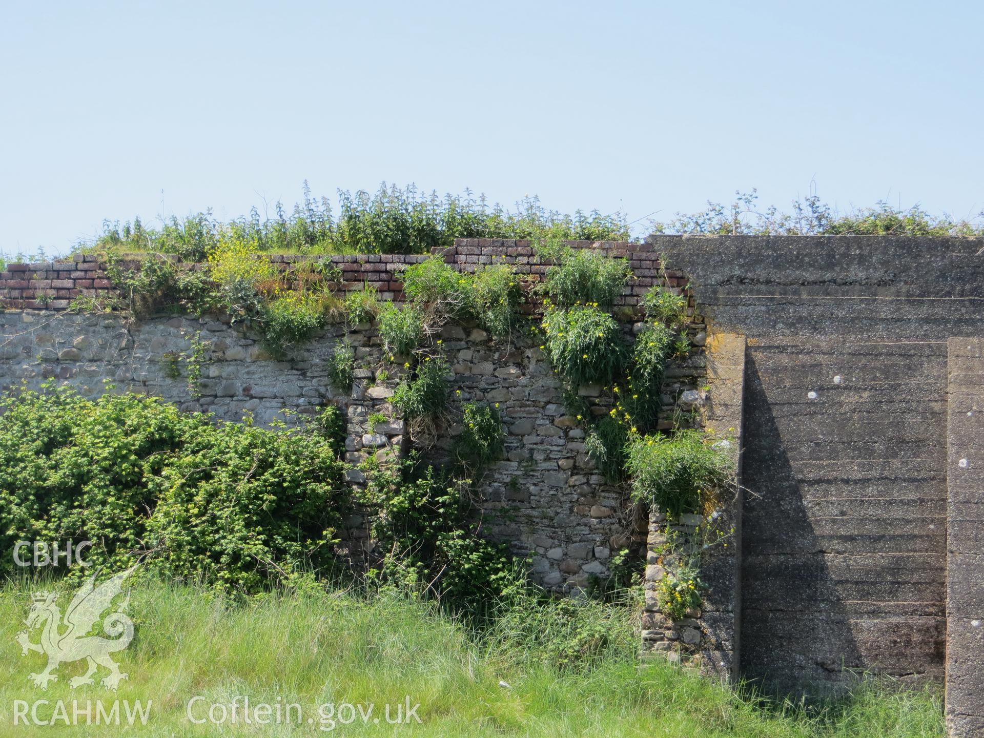 Buttressing of revetment wall.