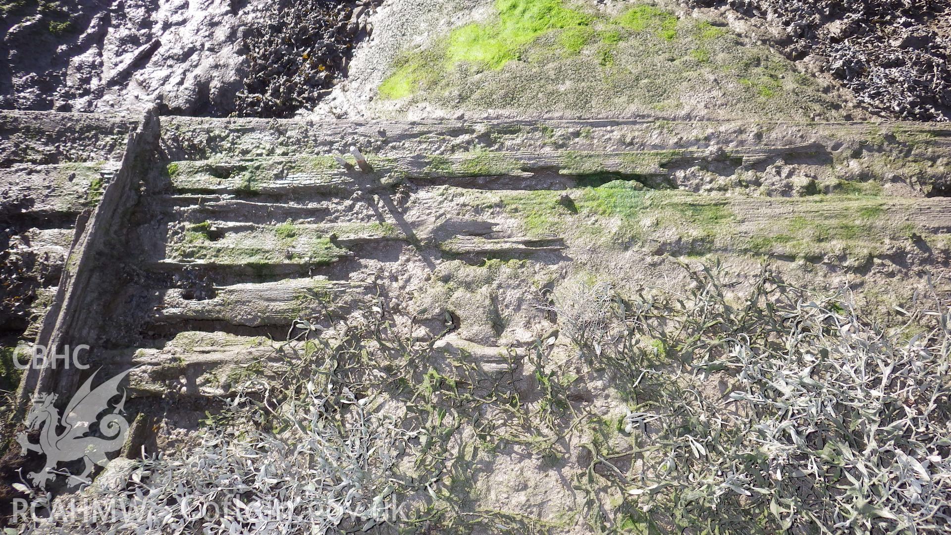 Run of external planking and frame fallen outwards into channel (southwestern side)
