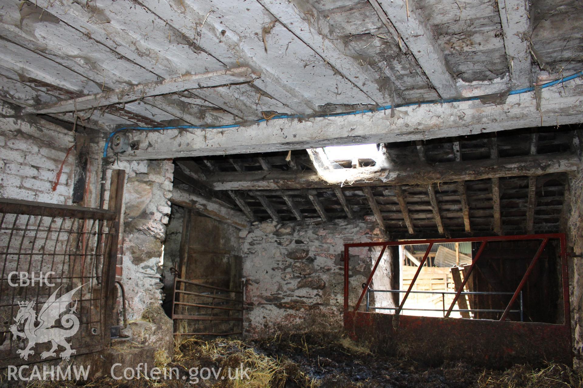 Interior; kitchen, with exposed girt showing motrices for timber studs