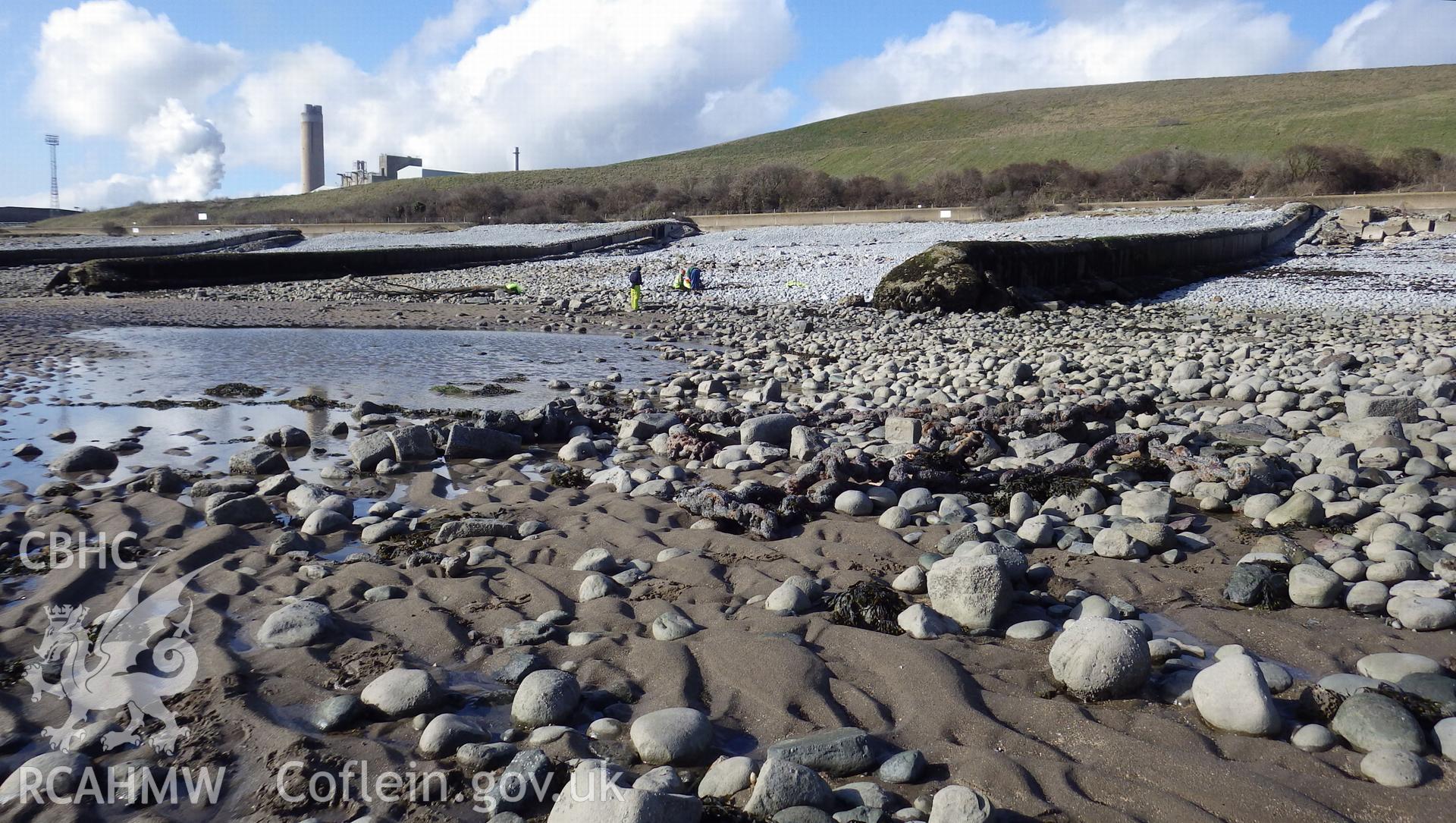 Site viewed from southeast towards Aberthaw power station with length of anchor cable in foreground